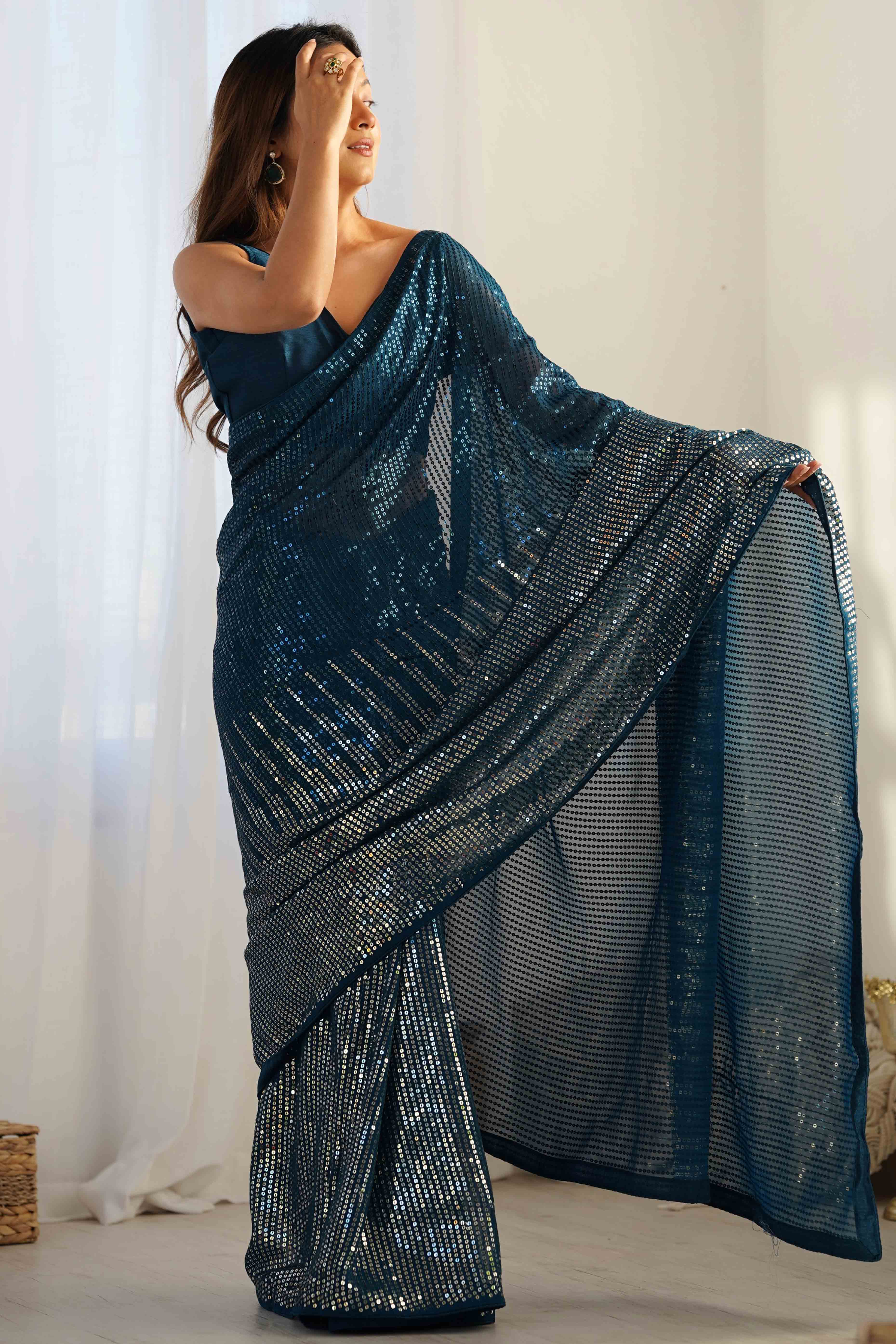 Teal Sequins Embroidered Georgette Saree