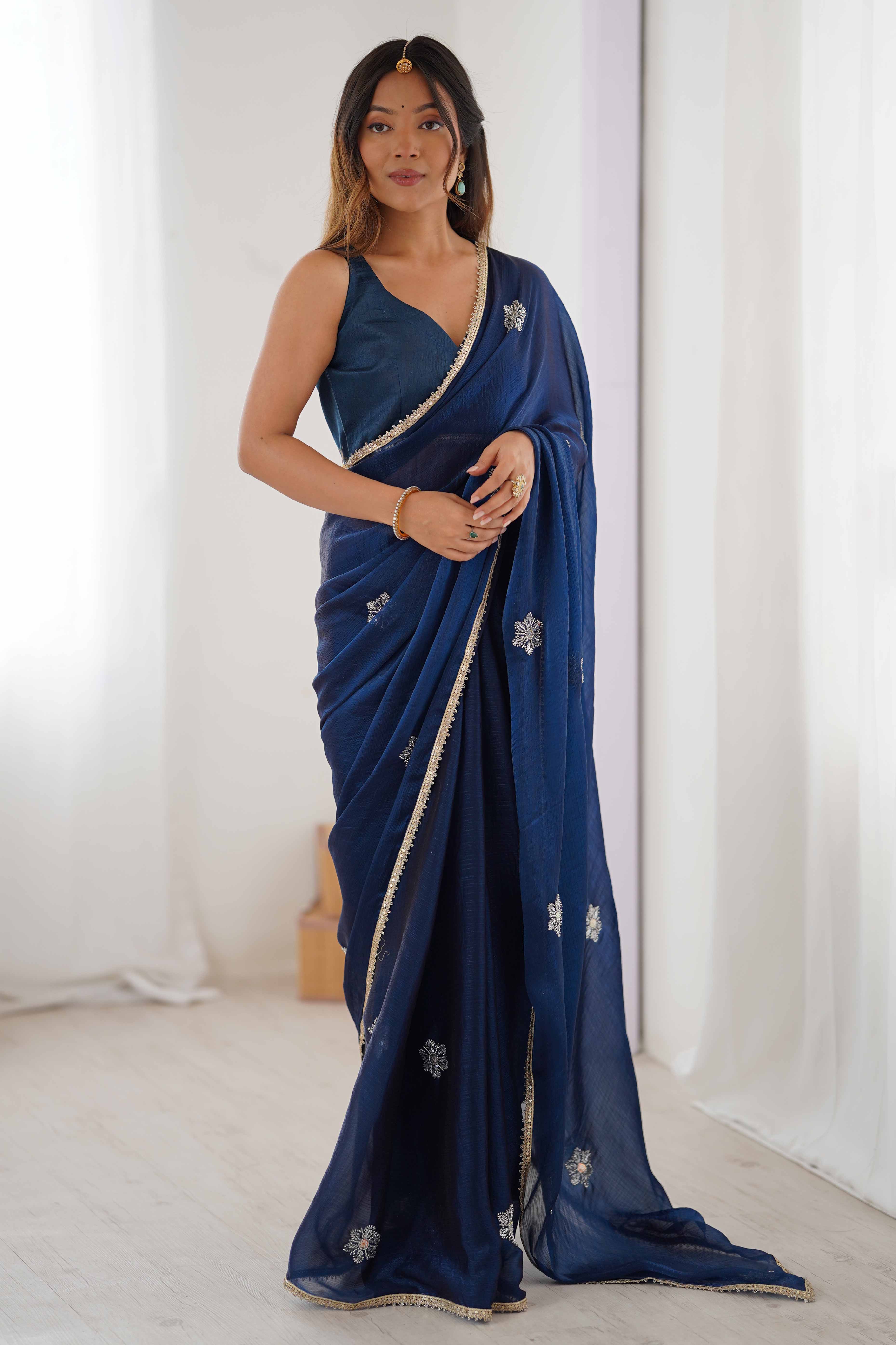 Blue Organza Saree Embellished with Intricate Floral Work and Elegant Lace Detailing