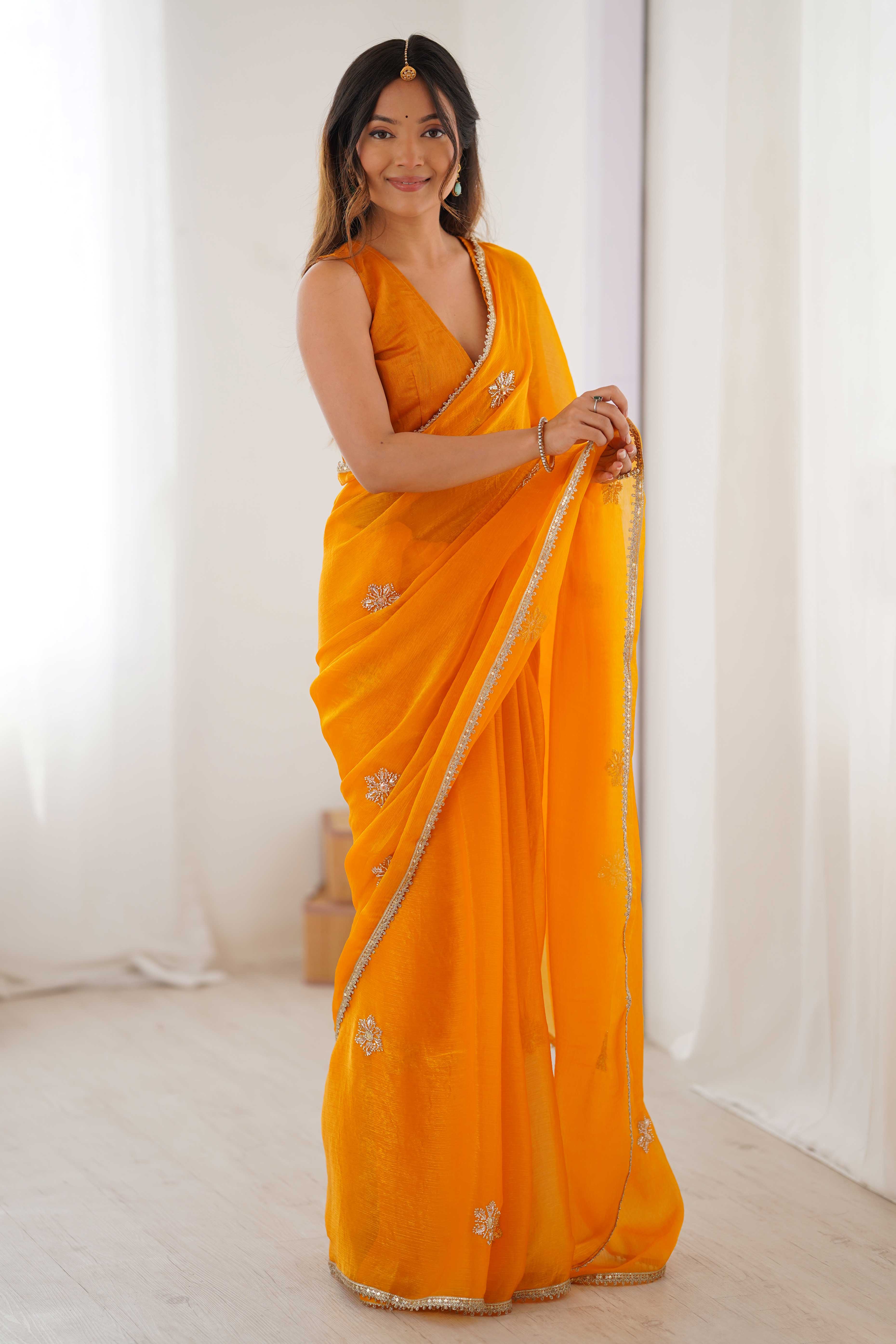 Mustard Yellow Organza Saree Embellished with Intricate Floral Work and Elegant Lace Detailing