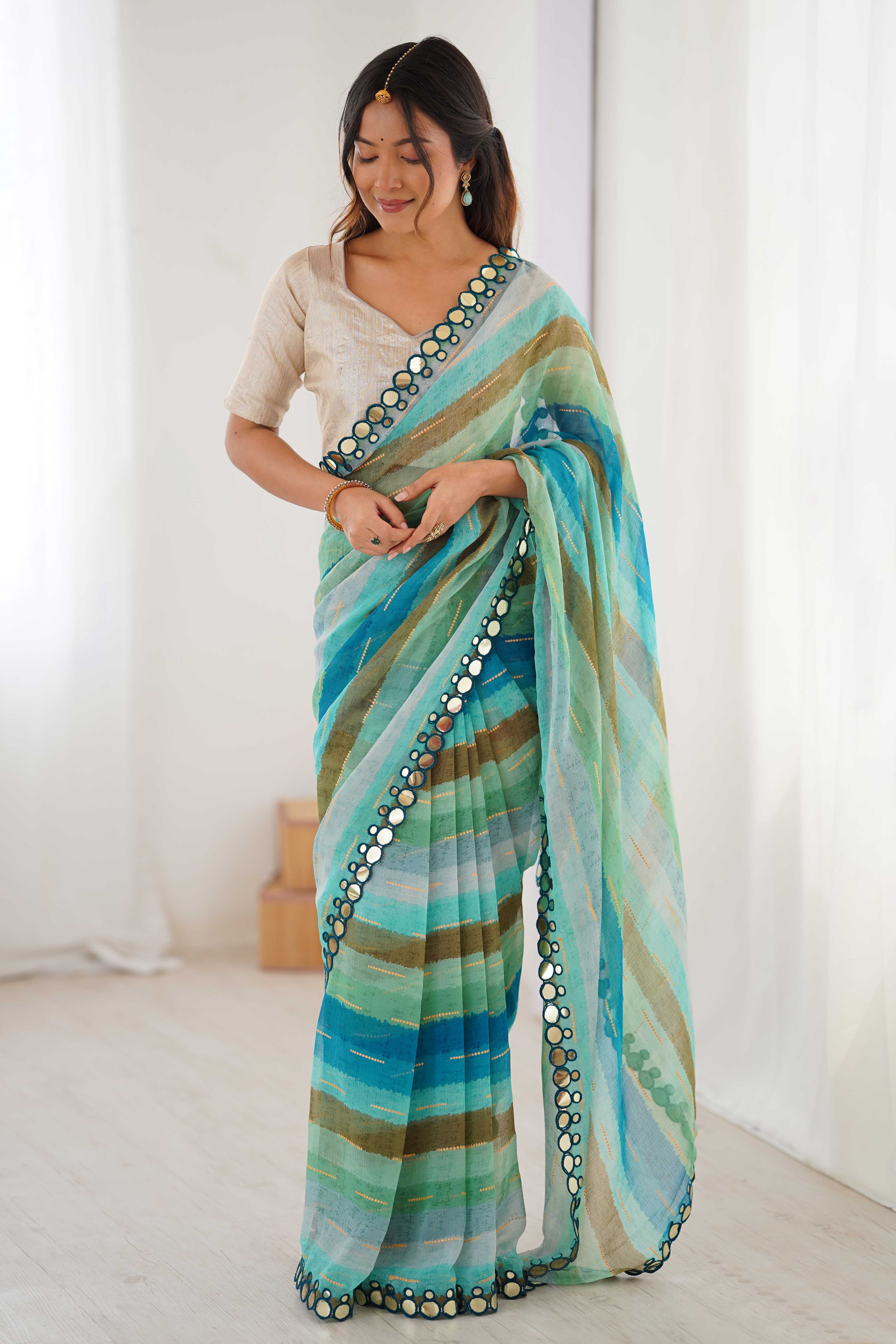Soft Chiffon Turquoise Saree Featuring Classic Leheriya and Mirror Work Edges