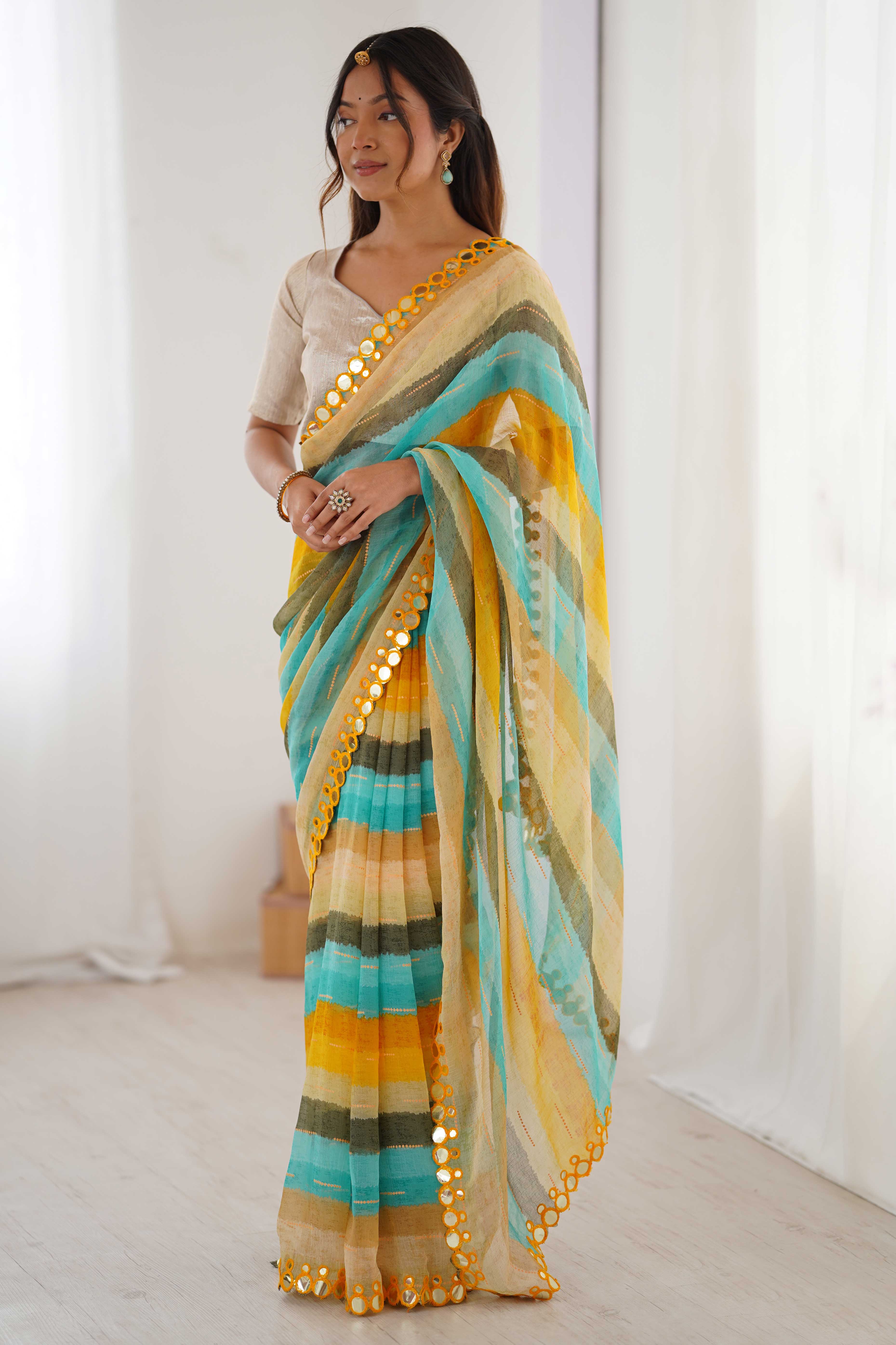 Soft Chiffon Yellow Saree Featuring Classic Leheriya and Mirror Work Edges