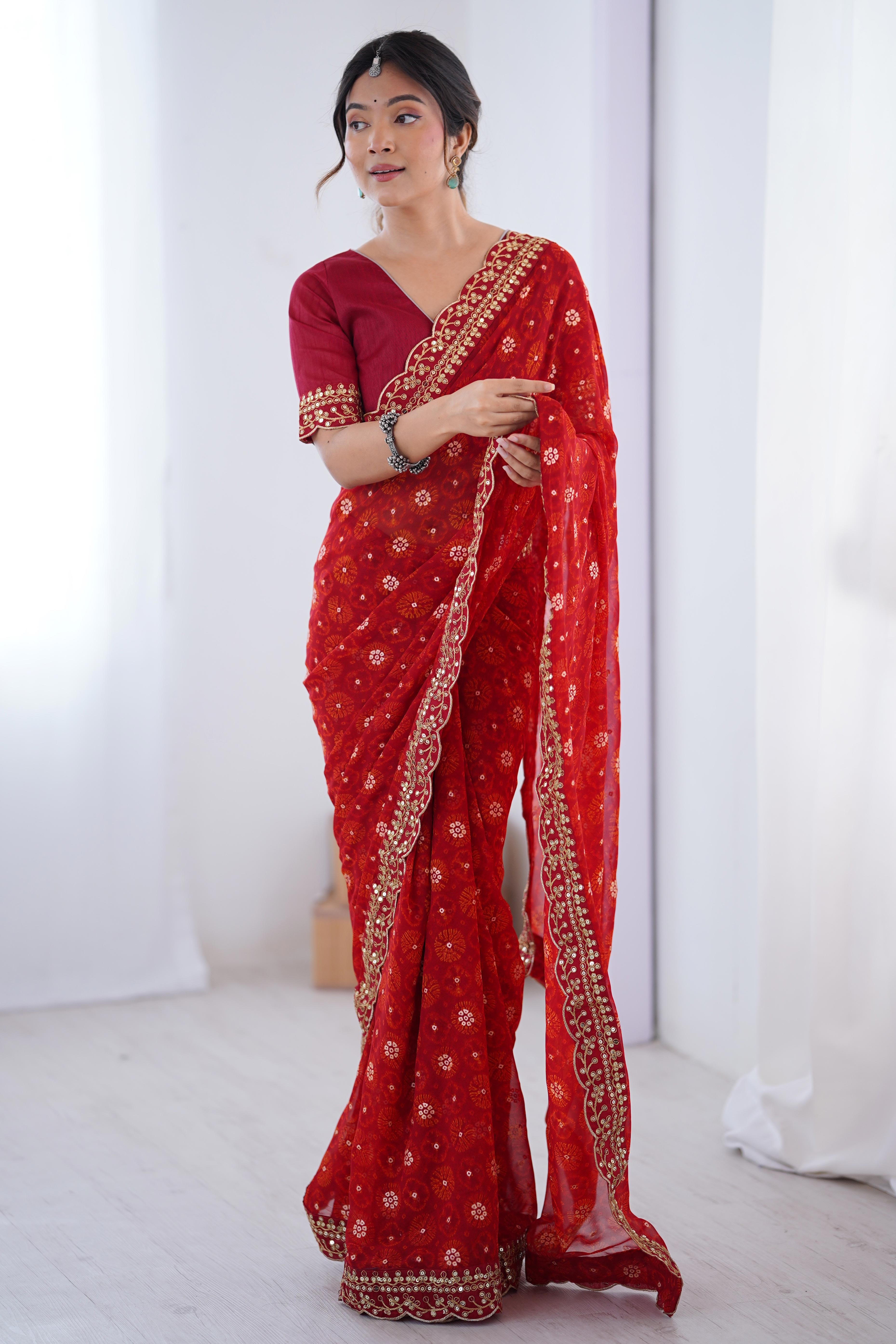 Soft Georgette Red Saree with Playful Print and Delicate Sequin Lace Work
