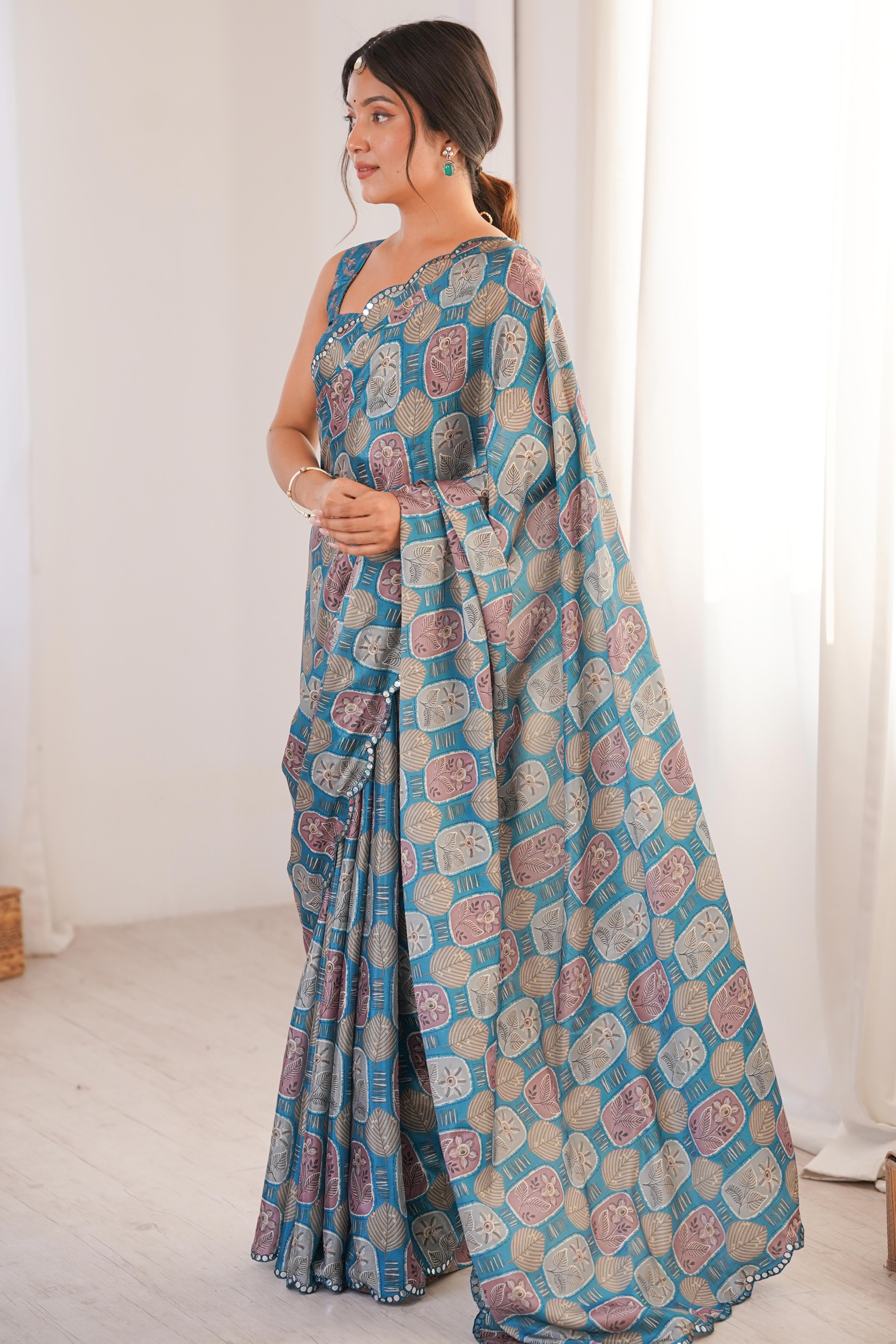 Timeless Teal Blue Floral Digital Printed Chinon Saree Enhanced With Fine Embroidered Border