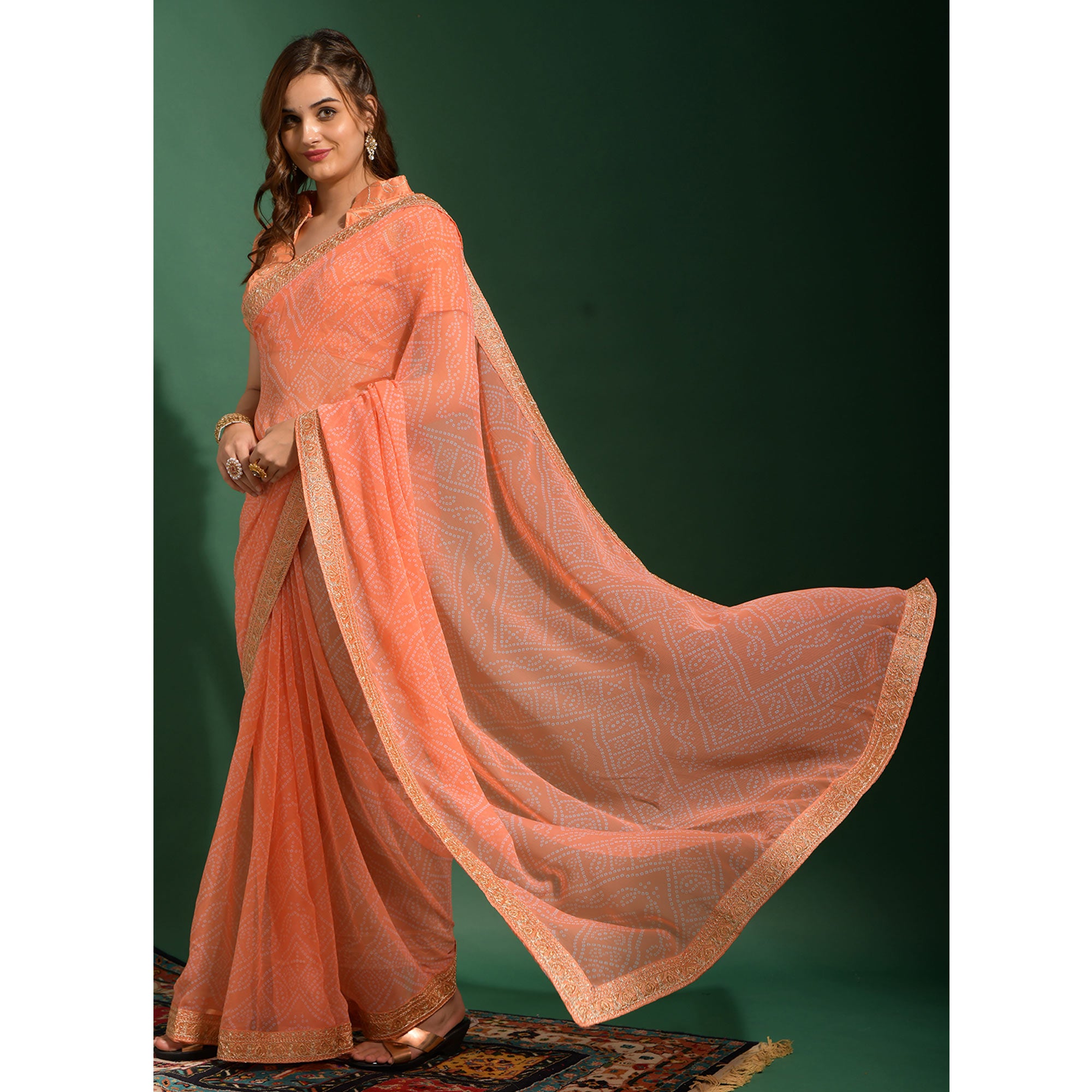 Peach Bandhani Printed Georgette Saree With Embroidered Border