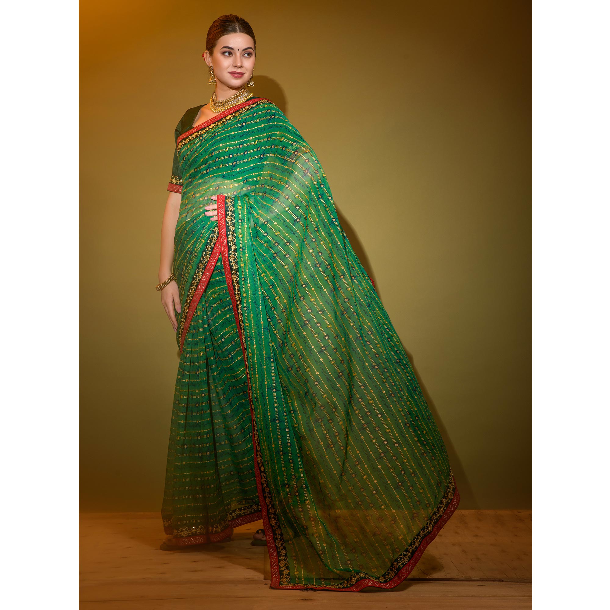 Green Foil Printed Georgette Saree With Embroidered Border