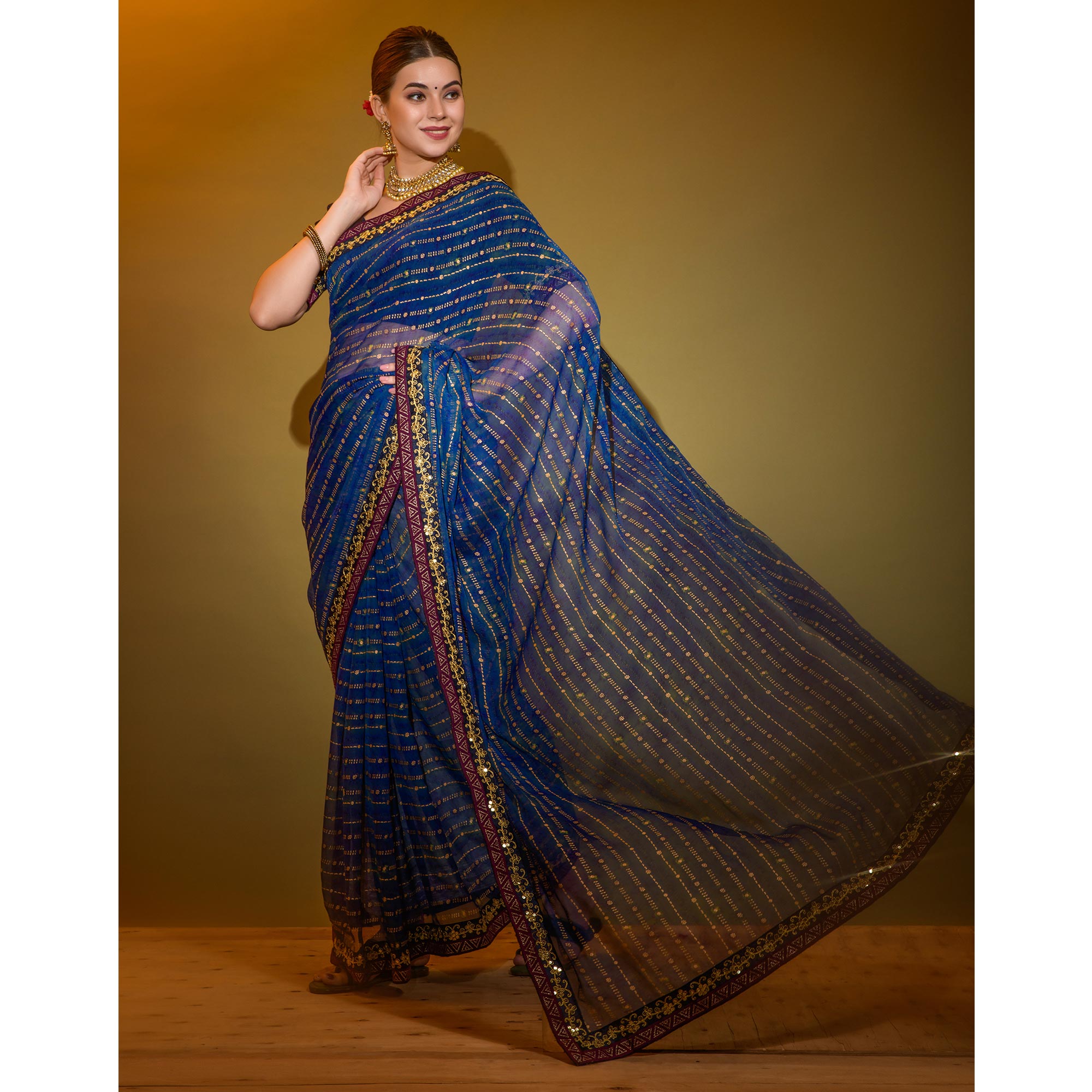 Blue Foil Printed Georgette Saree With Embroidered Border