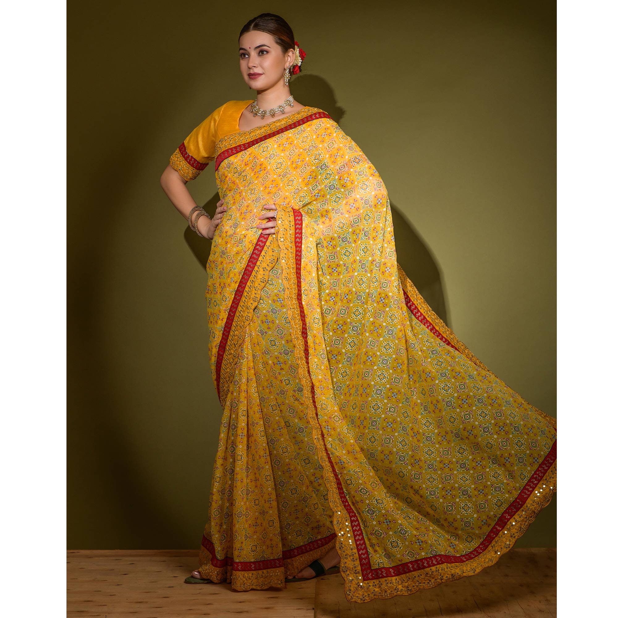 Yellow Patola Foil Printed Georgette Saree with Embroidered Border