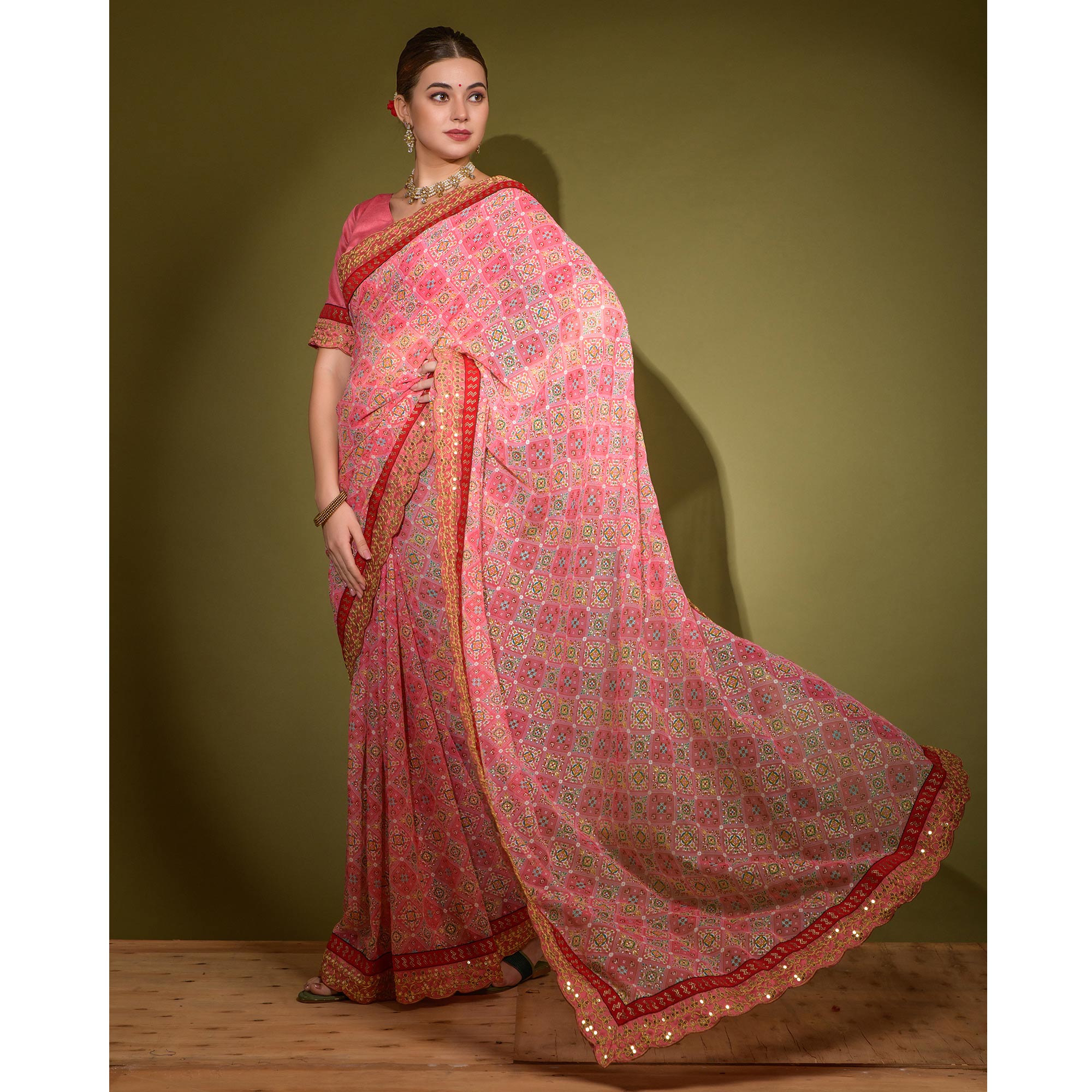 Pink Patola Foil Printed Georgette Saree with Embroidered Border