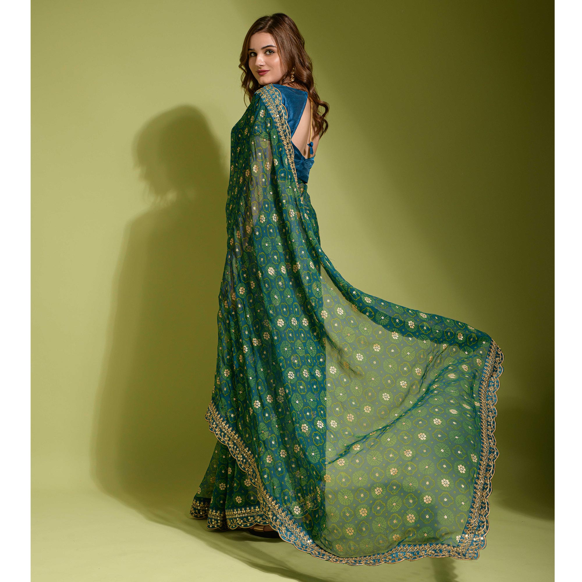 Teal Bandhani Foil Printed Georgette Saree With Embroidered Border