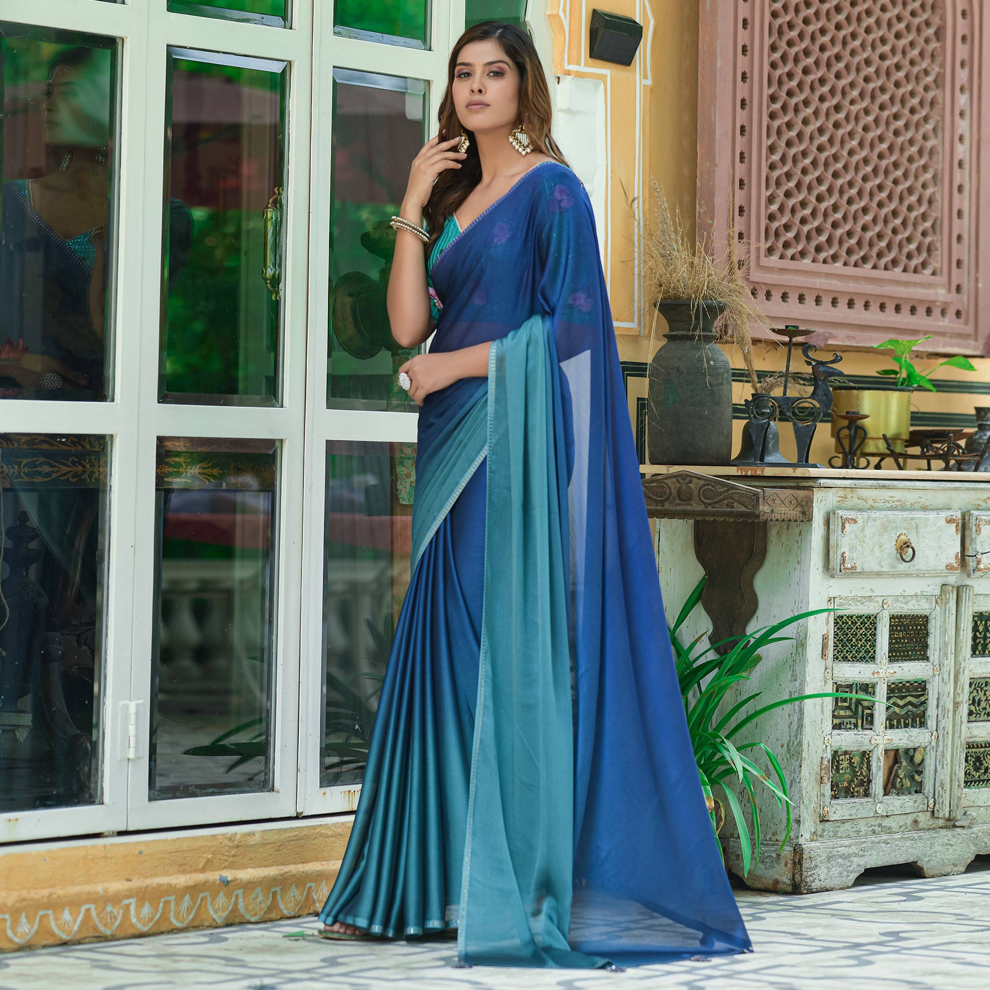 Blue Solid Chiffon Saree With Tassels