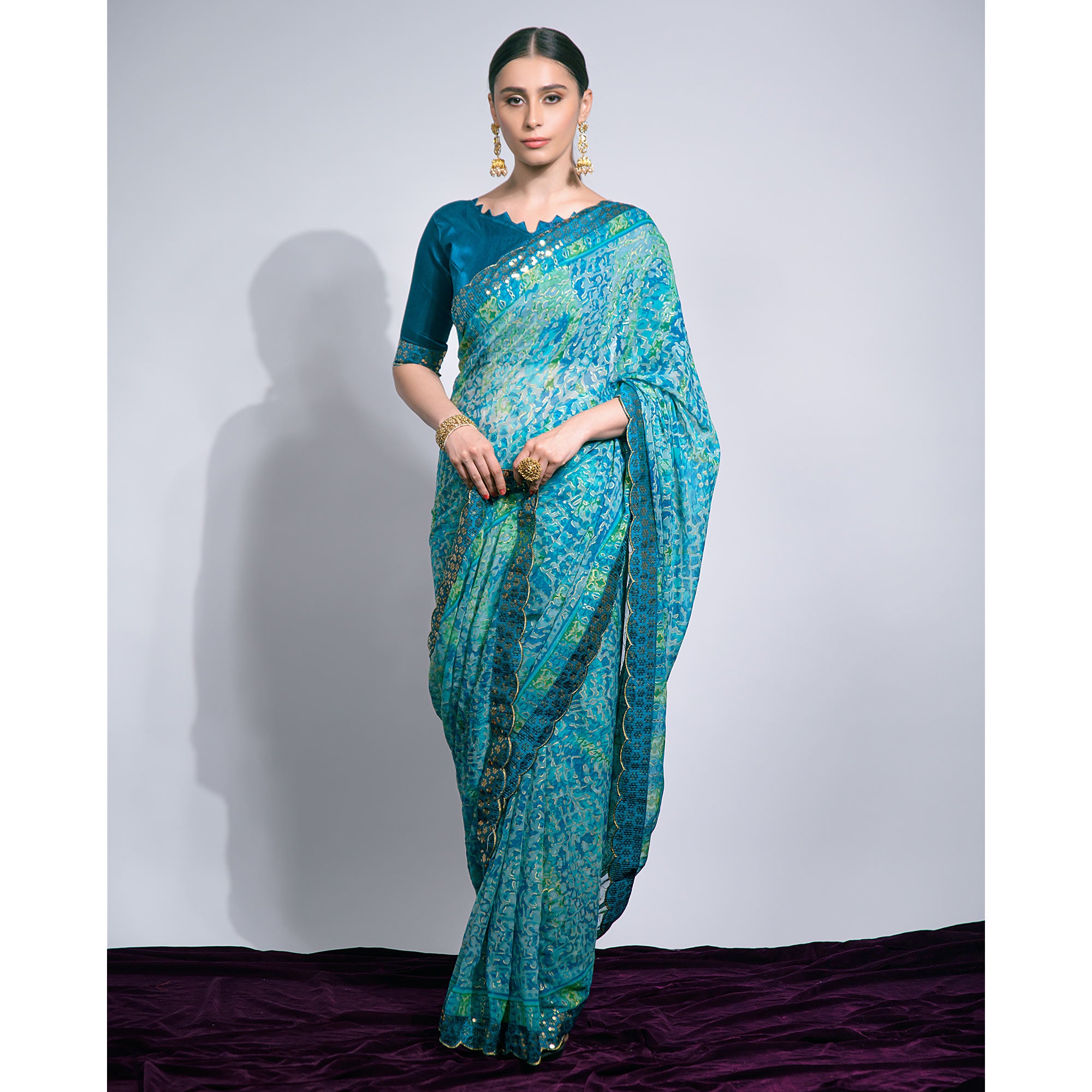 Blue Foil Printed Chiffon Saree With Embroidered Border