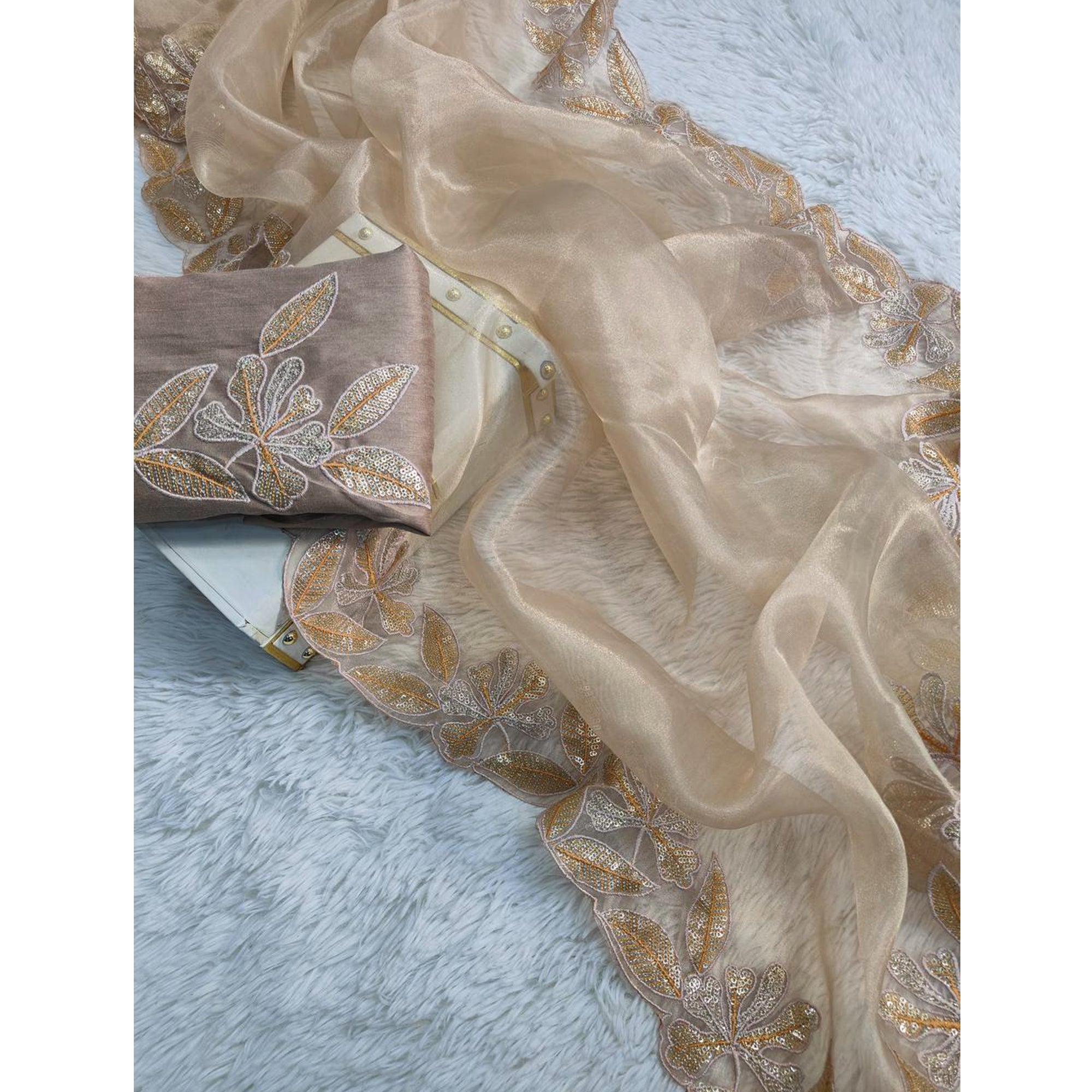 Sophisticated Beige Organza Silk Saree Beautified With Intricate Floral Embroidery & Sequins Work