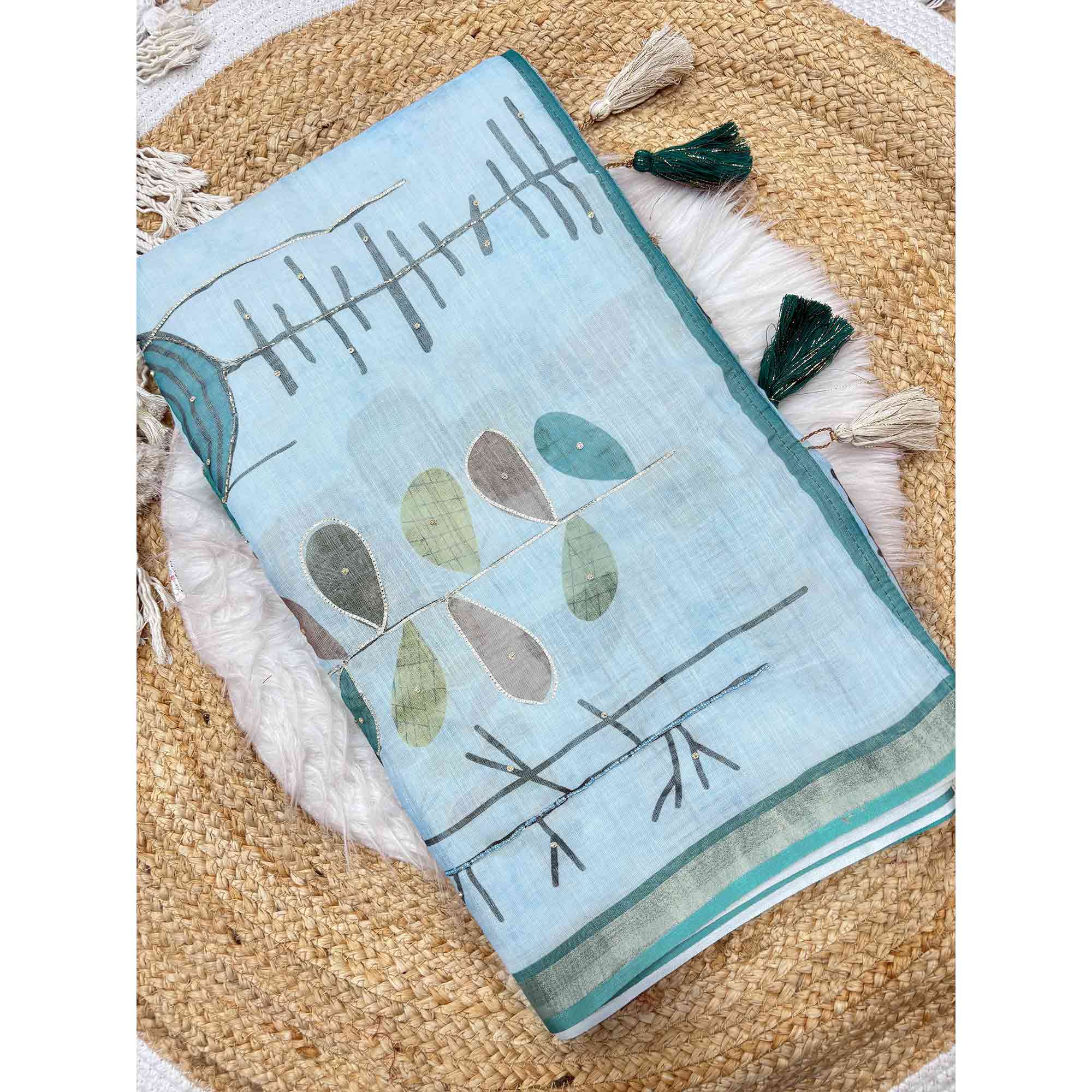 Sky Blue Pure Soft Linen Saree with Elegant Prints and Delicate Stone Work Embellishment