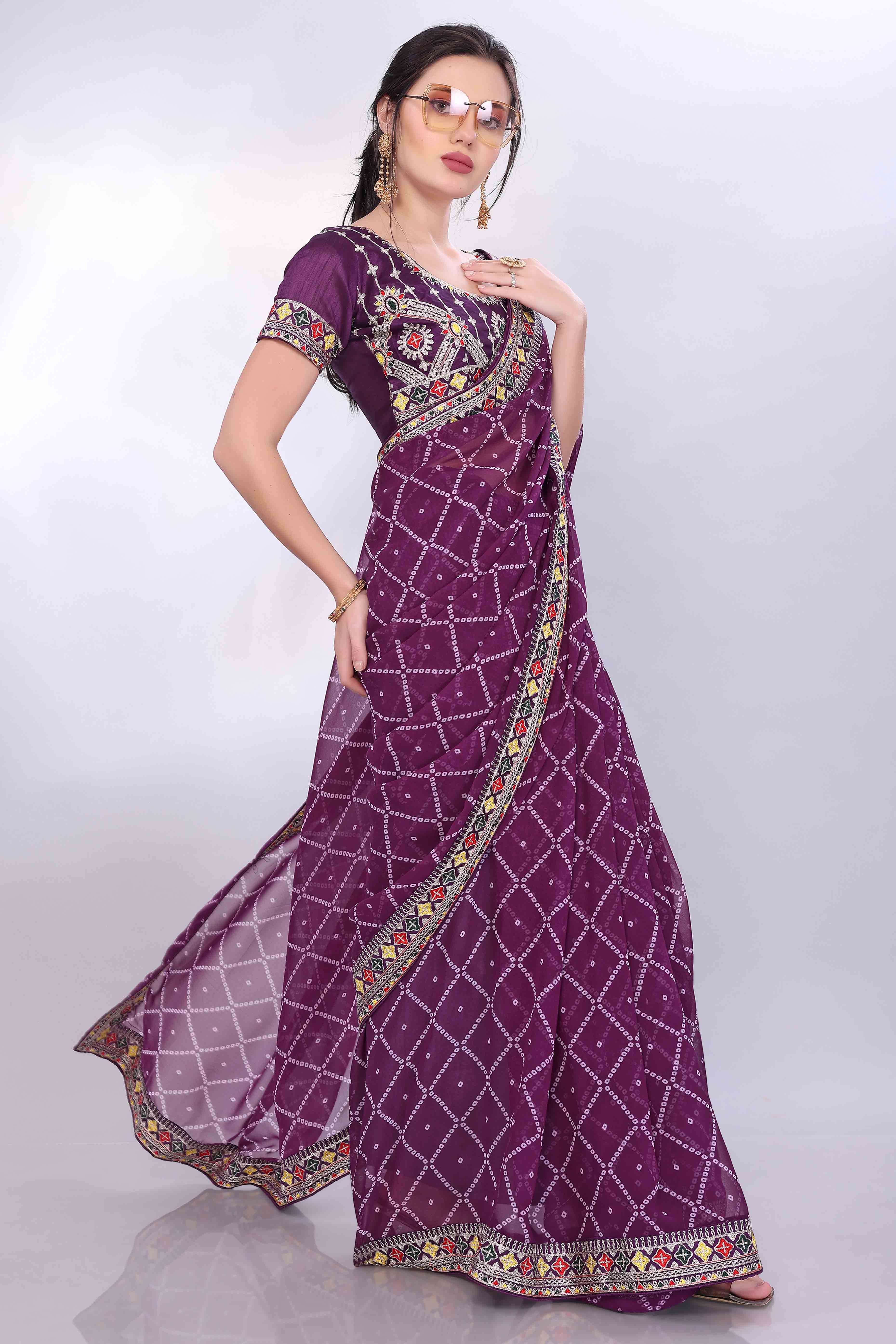 Wine Bandhani Printed Georgette Saree Framed With Elegant Embroidered Border