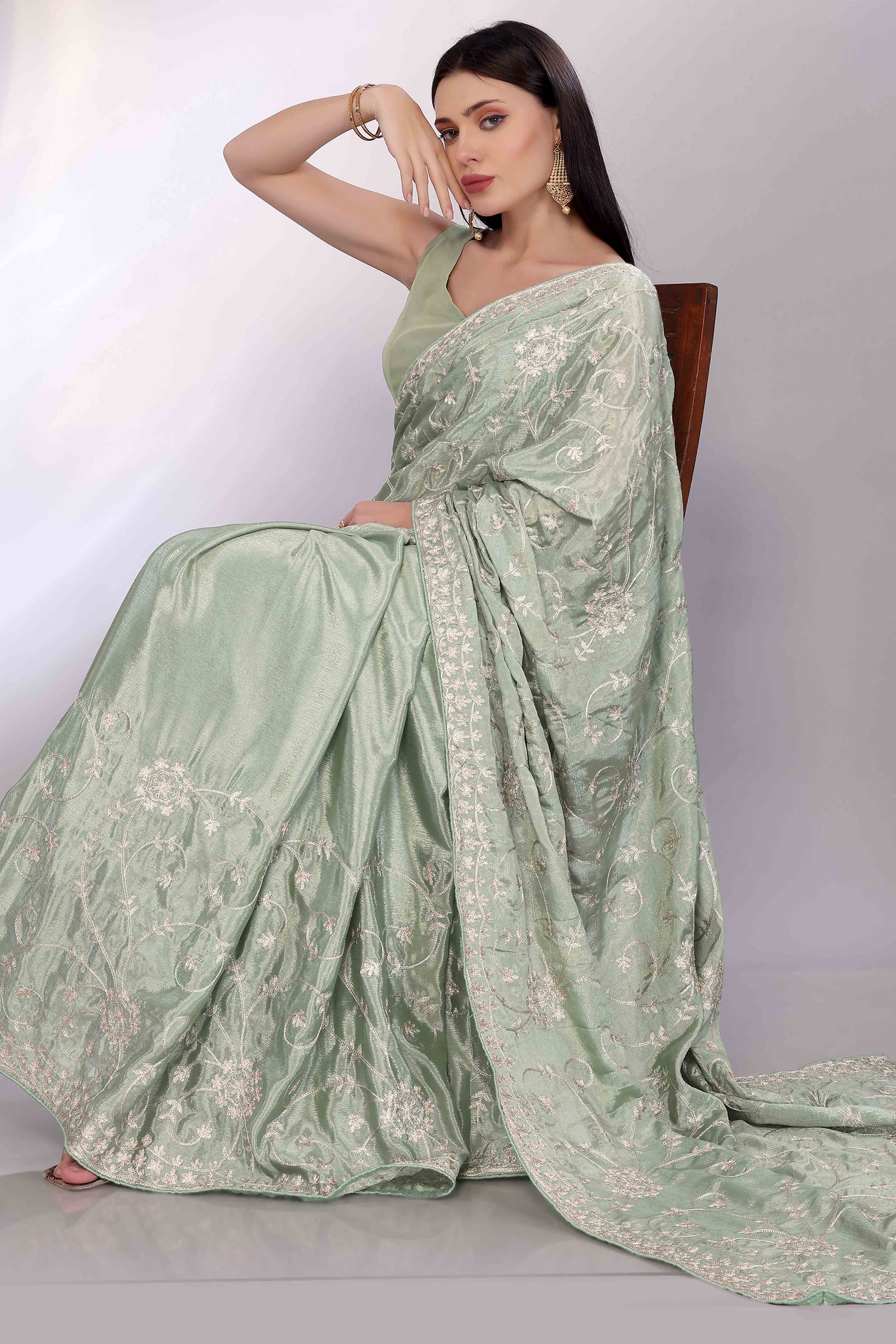Sage Green Chinon Silk Saree Adorned With Fine Floral Thread Work