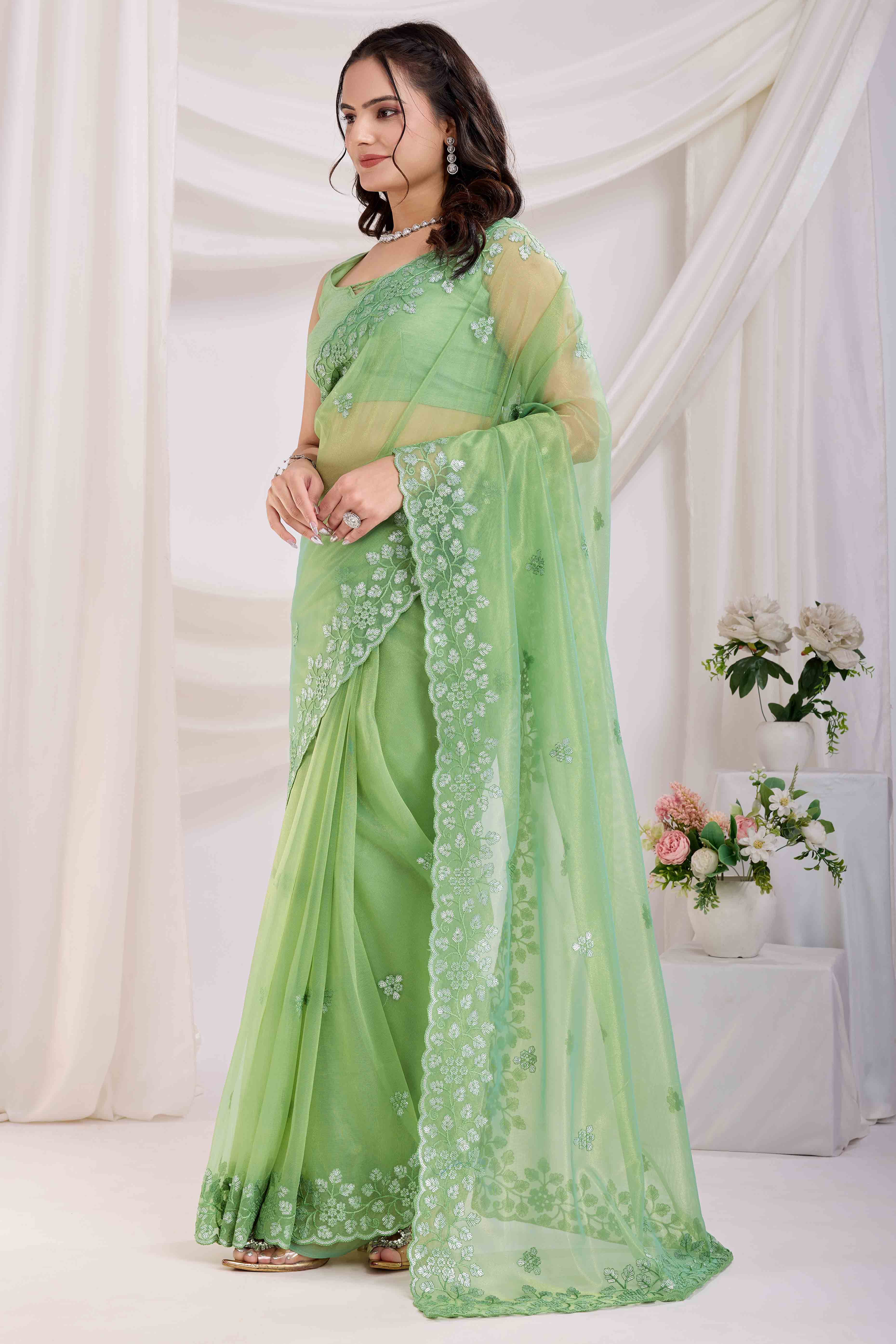 Green Floral Sequins Embroidered Twill Net Saree