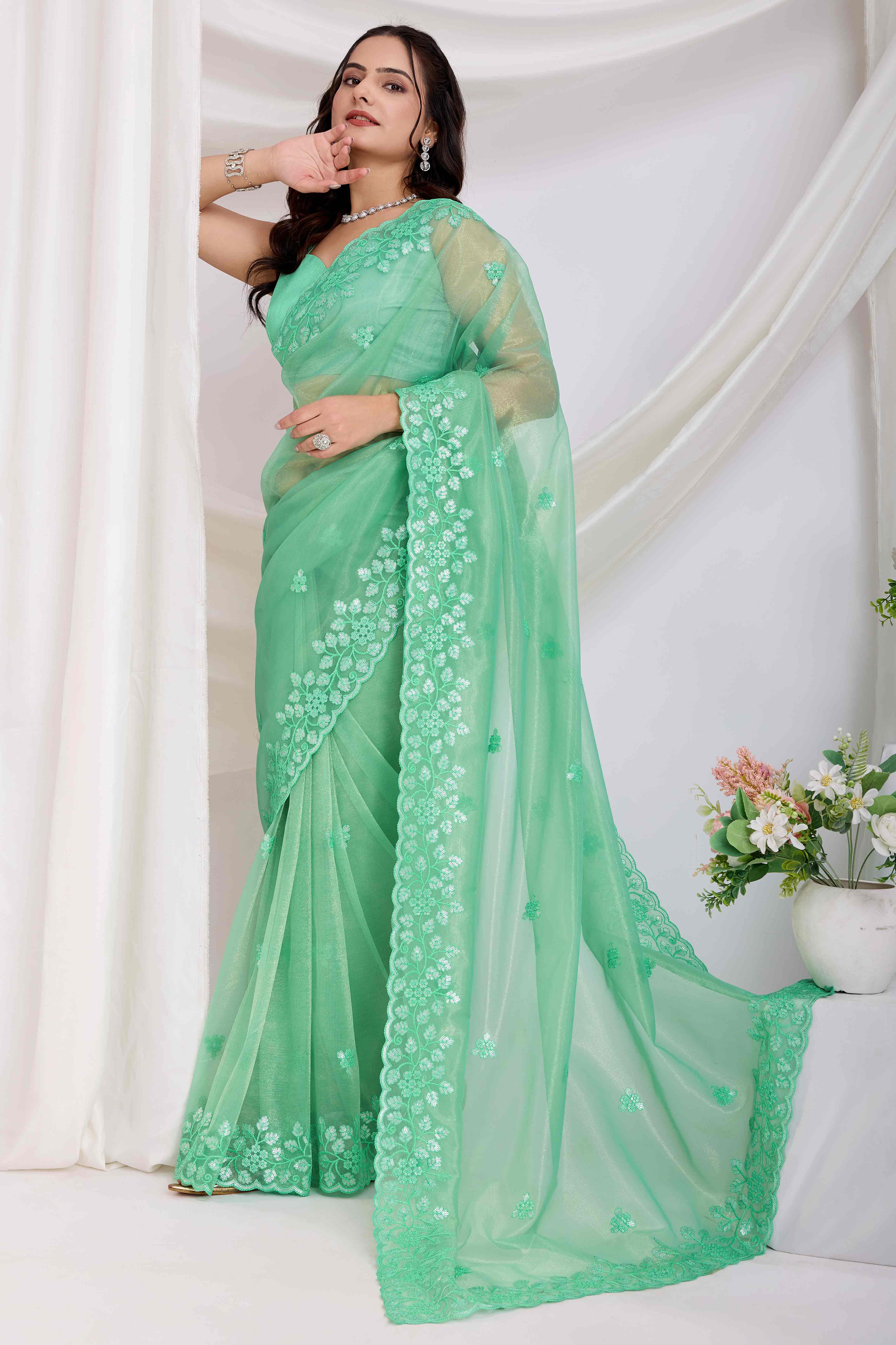 Sea Green Floral Sequins Embroidered Twill Net Saree