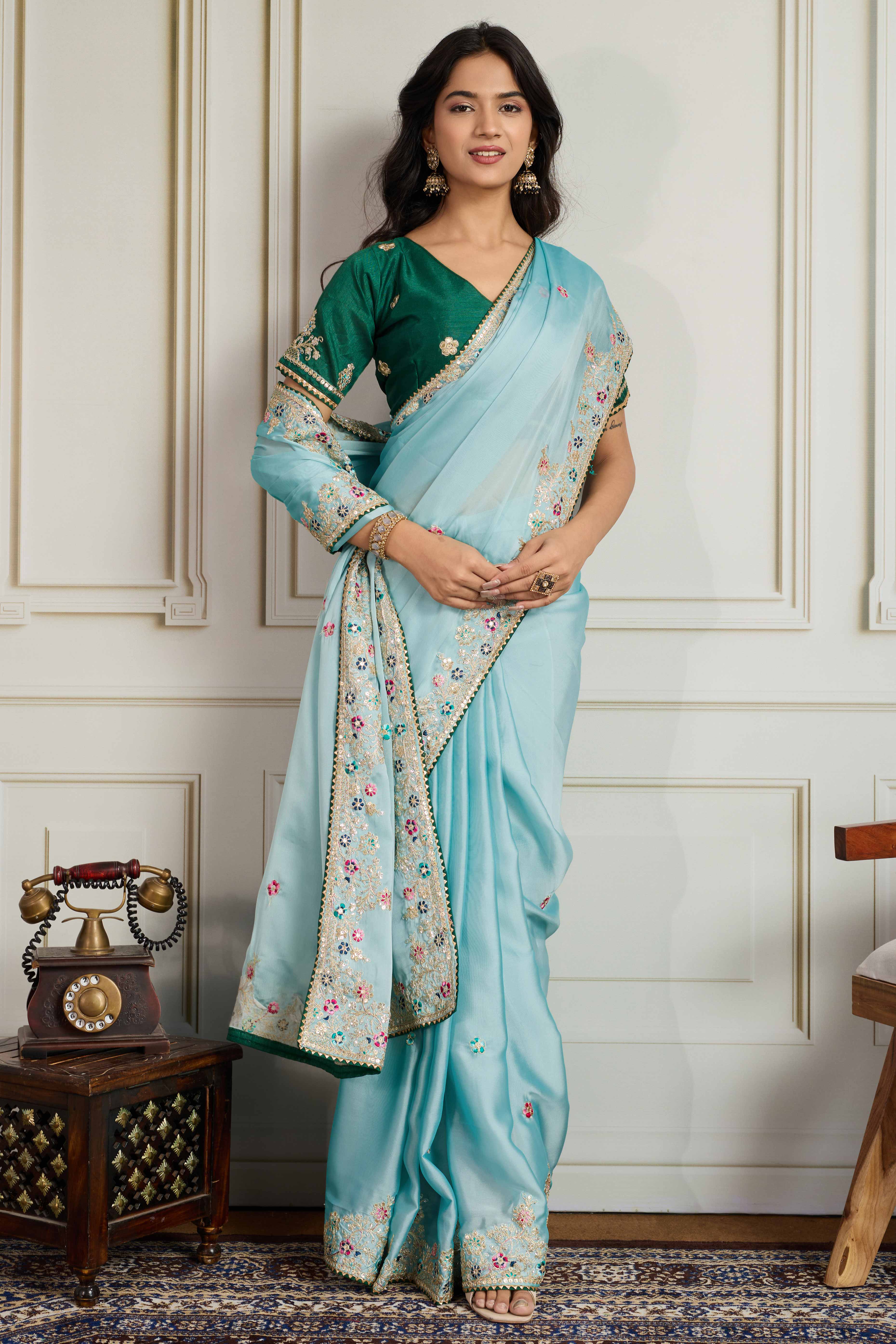 Aqua Blue Star Georgette Party Saree with Sequins and Floral Embroidery
