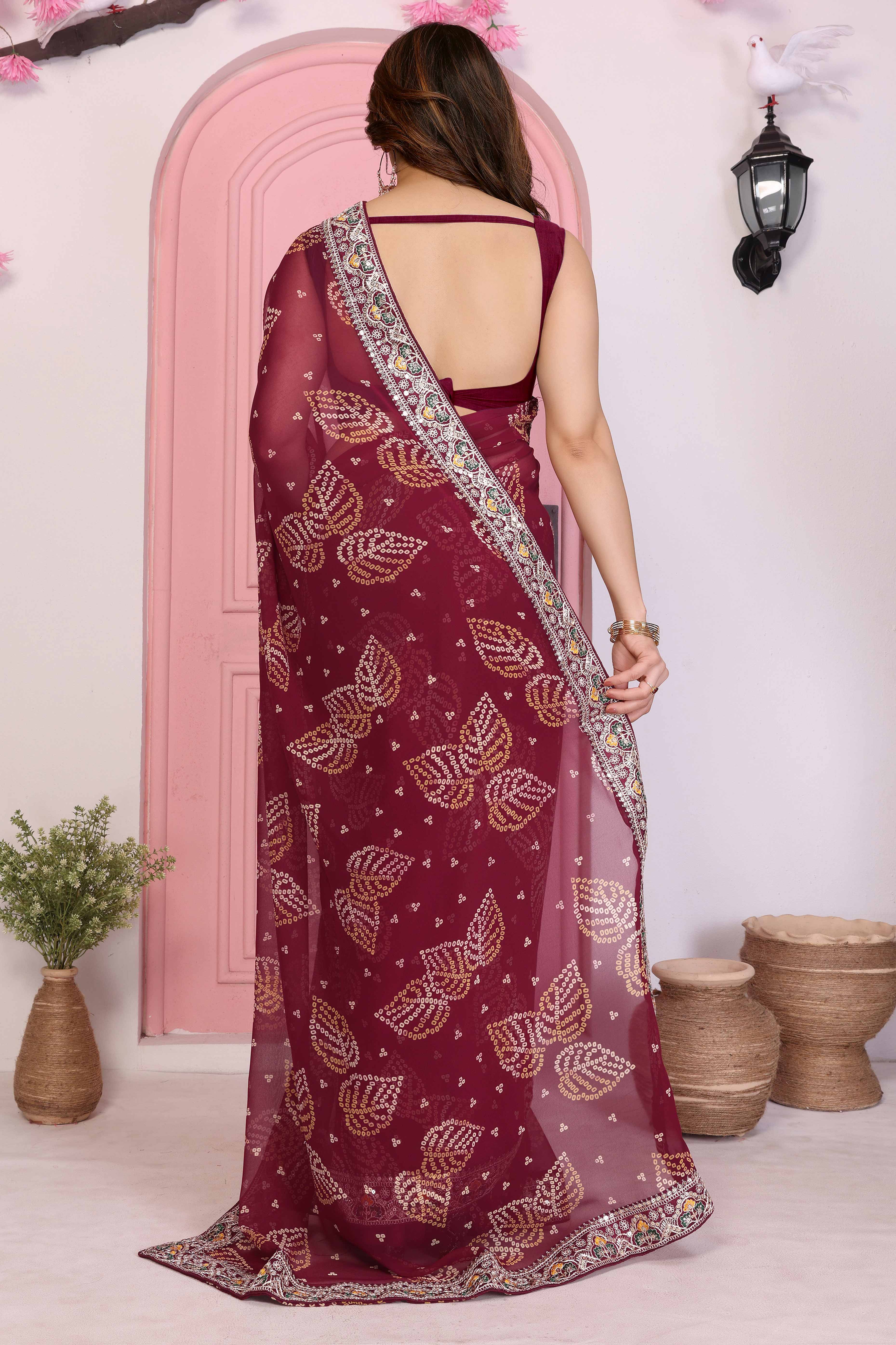 Maroon Georgette Saree with Traditional Bandhani Print and Lace Accents