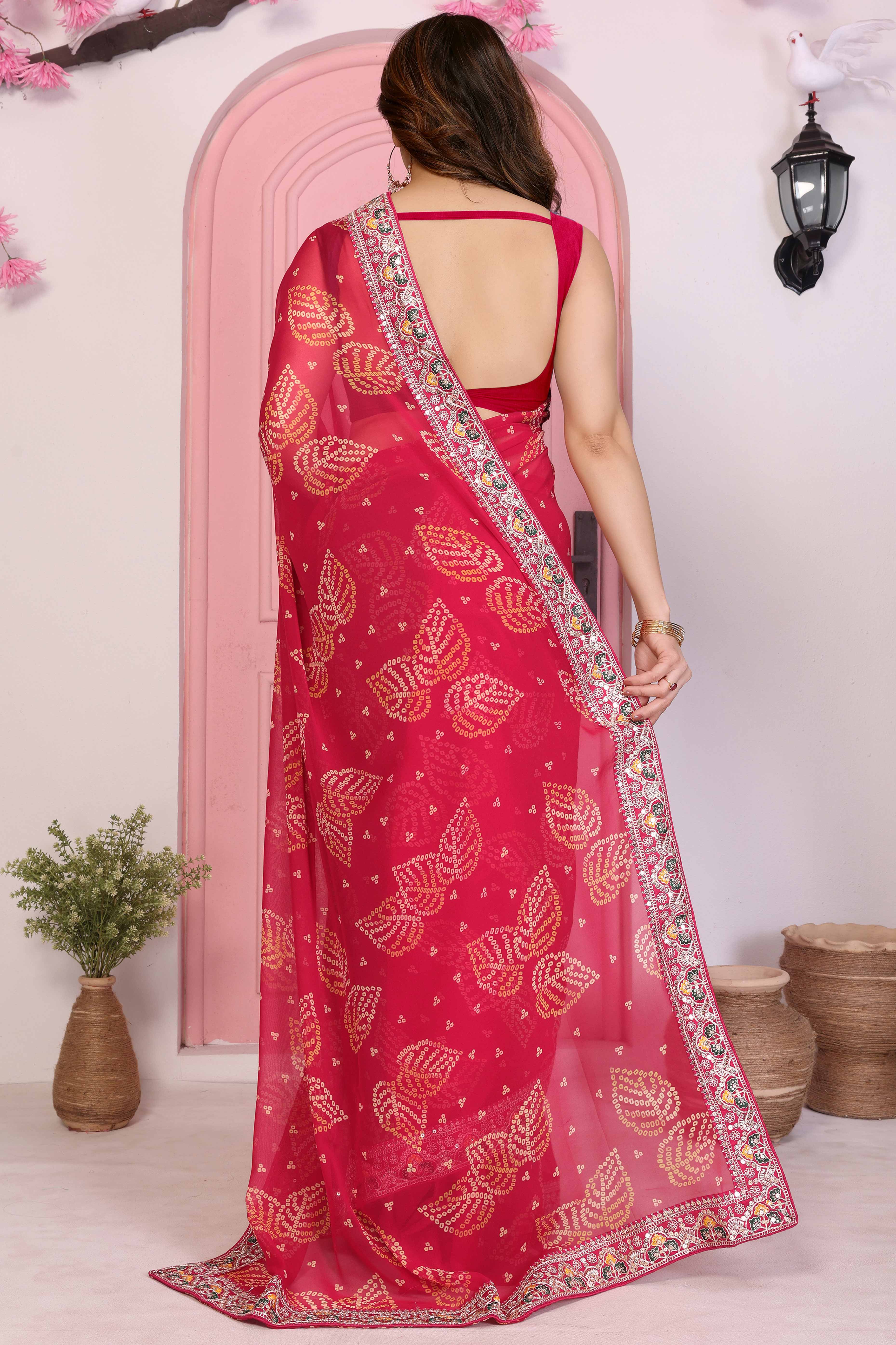 Pink Georgette Saree with Traditional Bandhani Print and Lace Accents