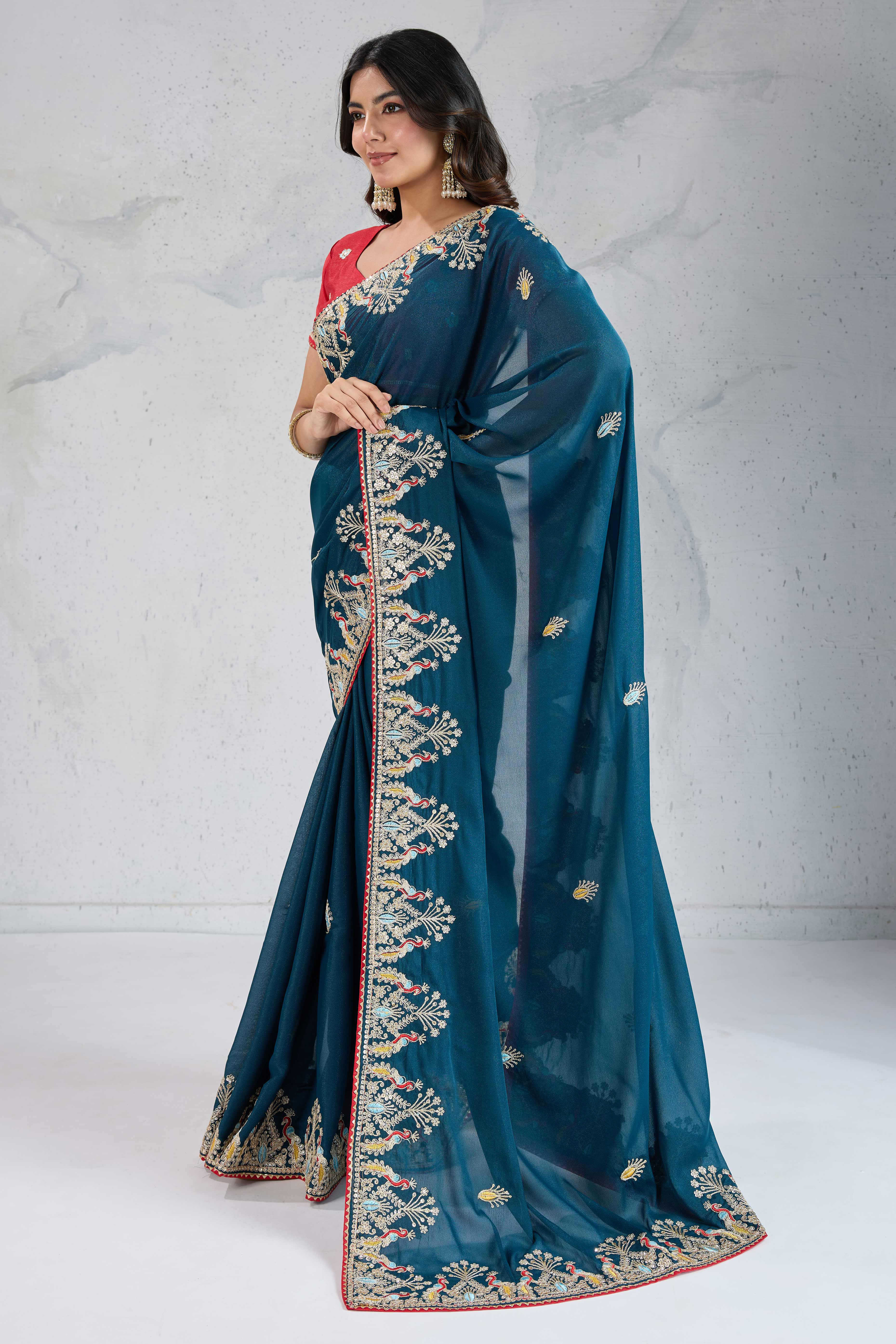Teal Embroidered Saree with Ethnic Detailing in Georgette Fabric