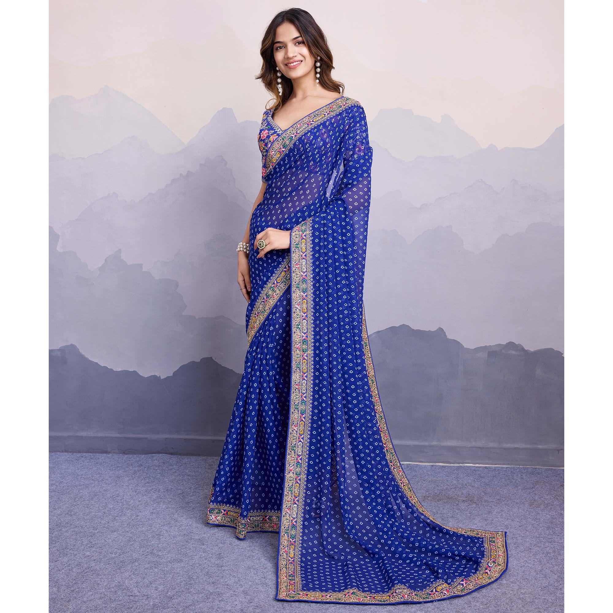 Blue Bandhani Printed Georgette Saree With Embroidered Lace Border