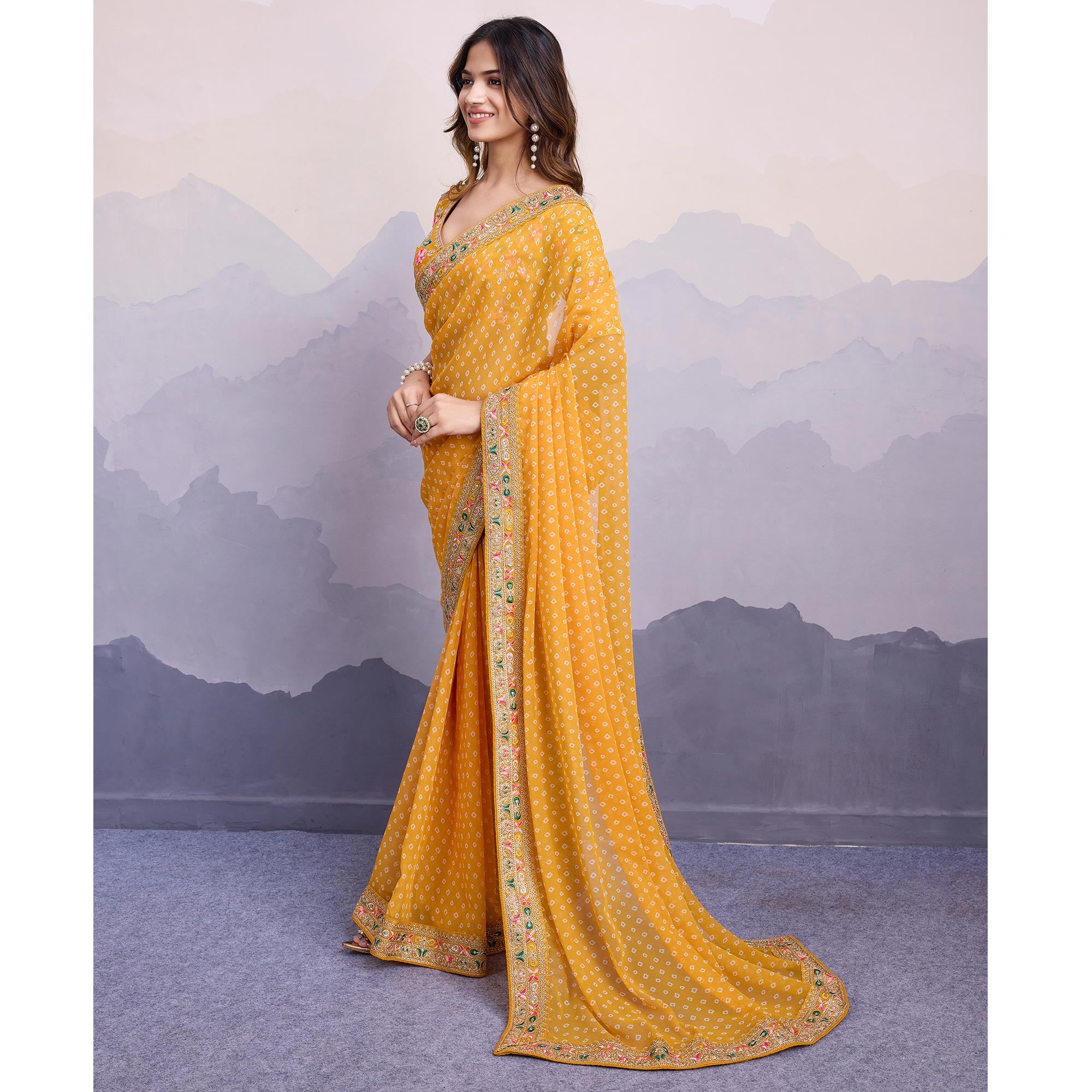 Yellow Bandhani Printed Georgette Saree With Embroidered Lace Border