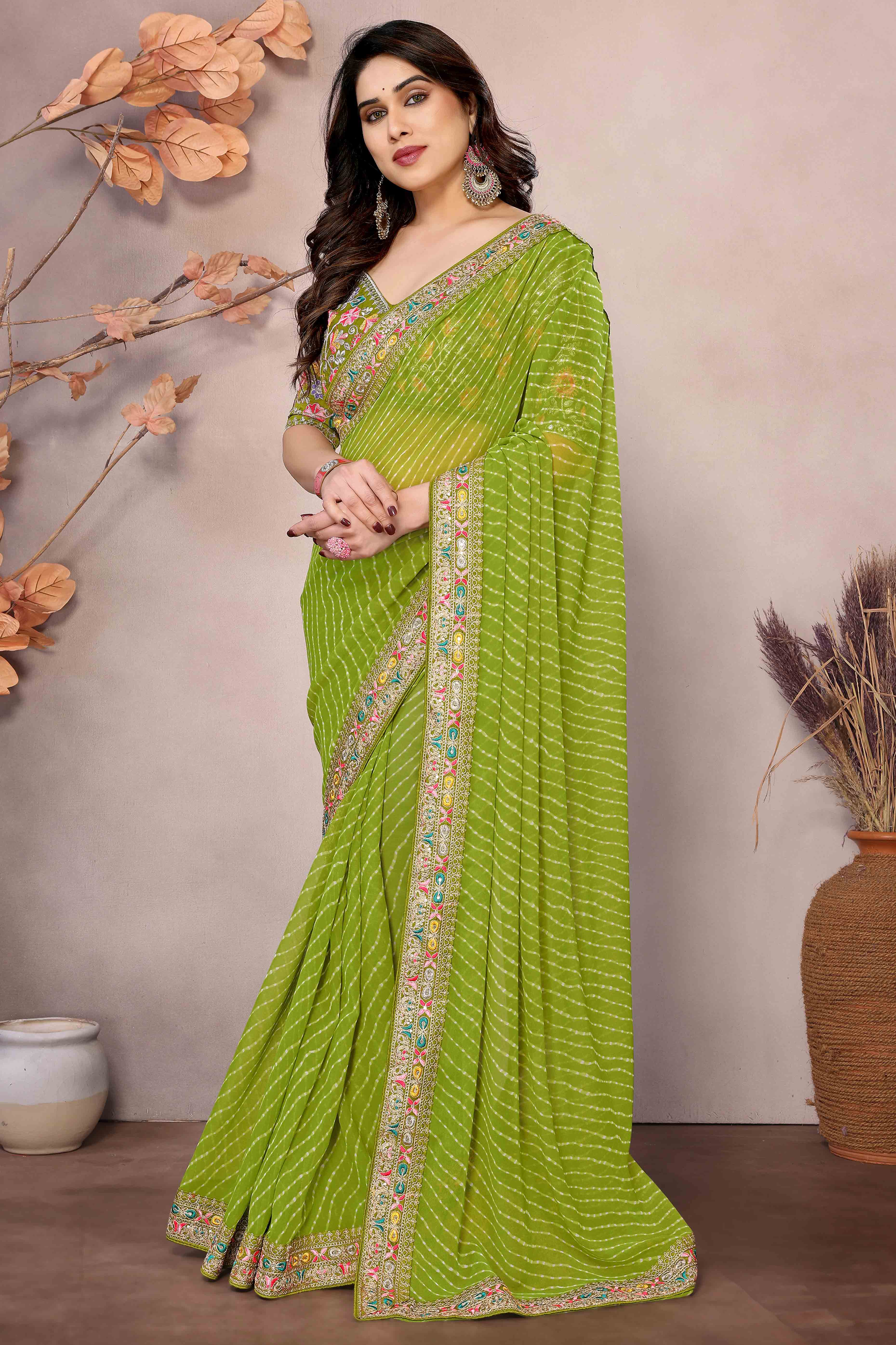 Green Striped Printed Georgette Saree With Glittering Sequin Cording Embroidered Border