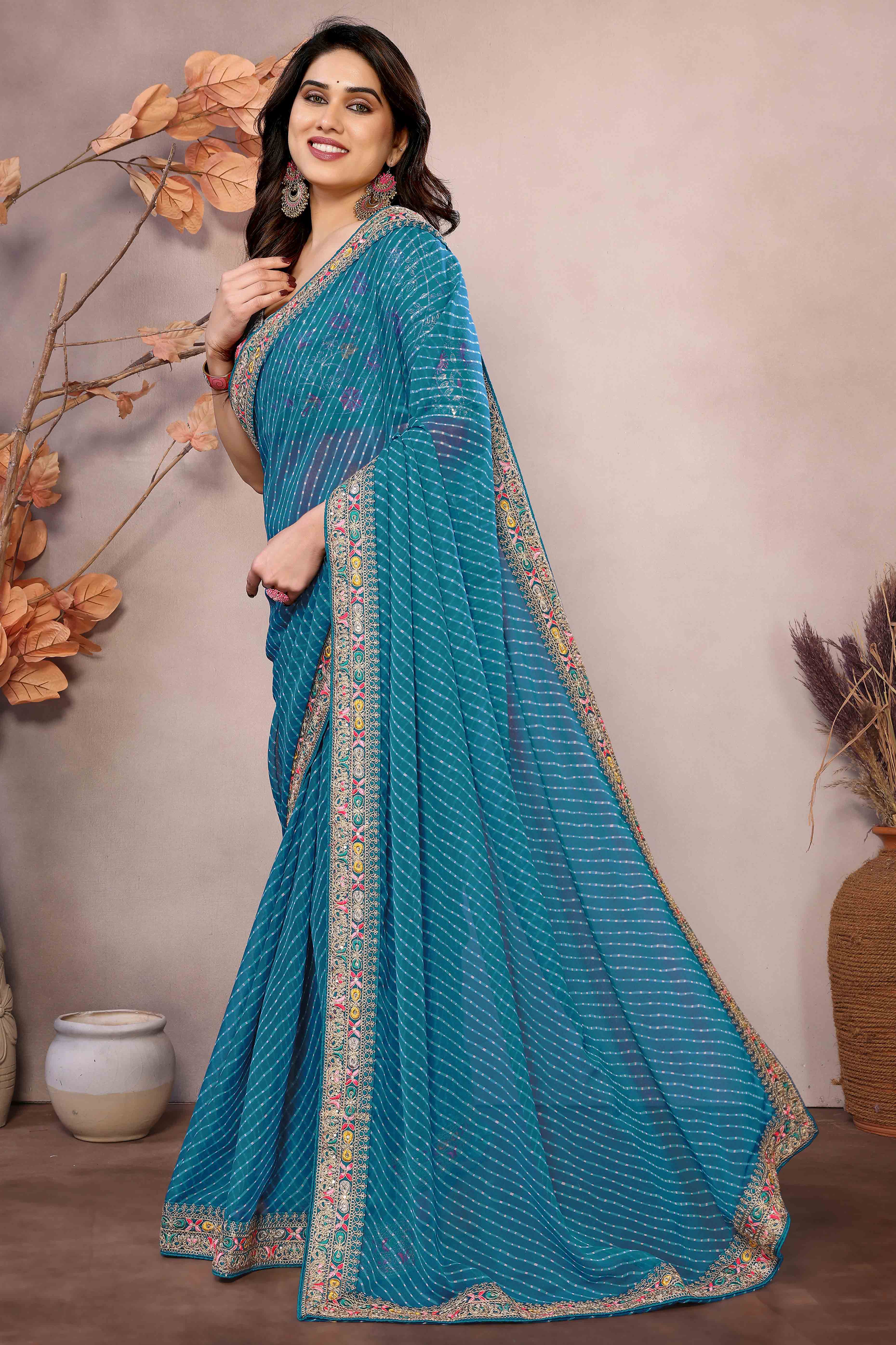 Blue Striped Printed Georgette Saree With Glittering Sequin Cording Embroidered Border