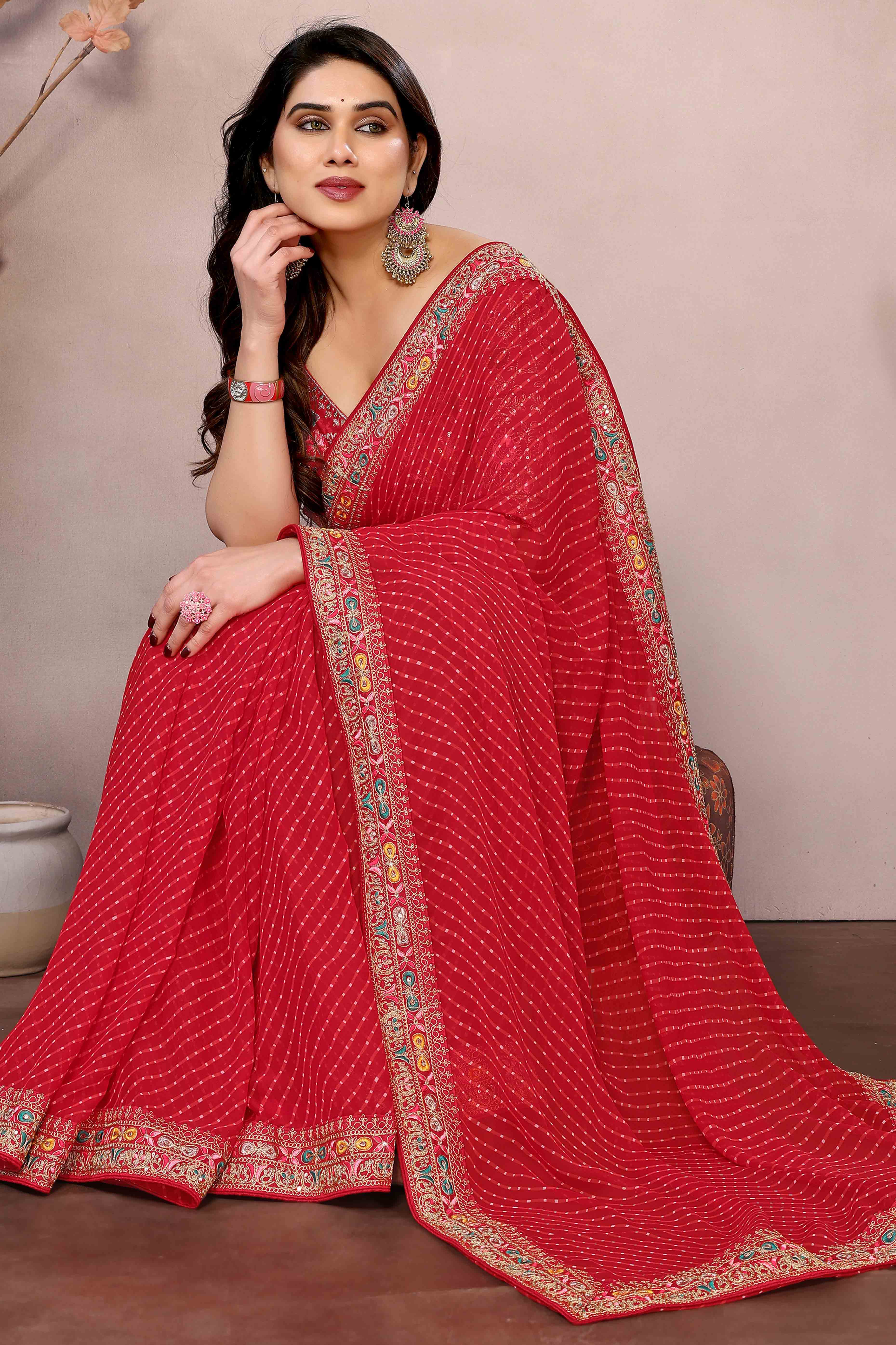 Red Striped Printed Georgette Saree With Glittering Sequin Cording Embroidered Border