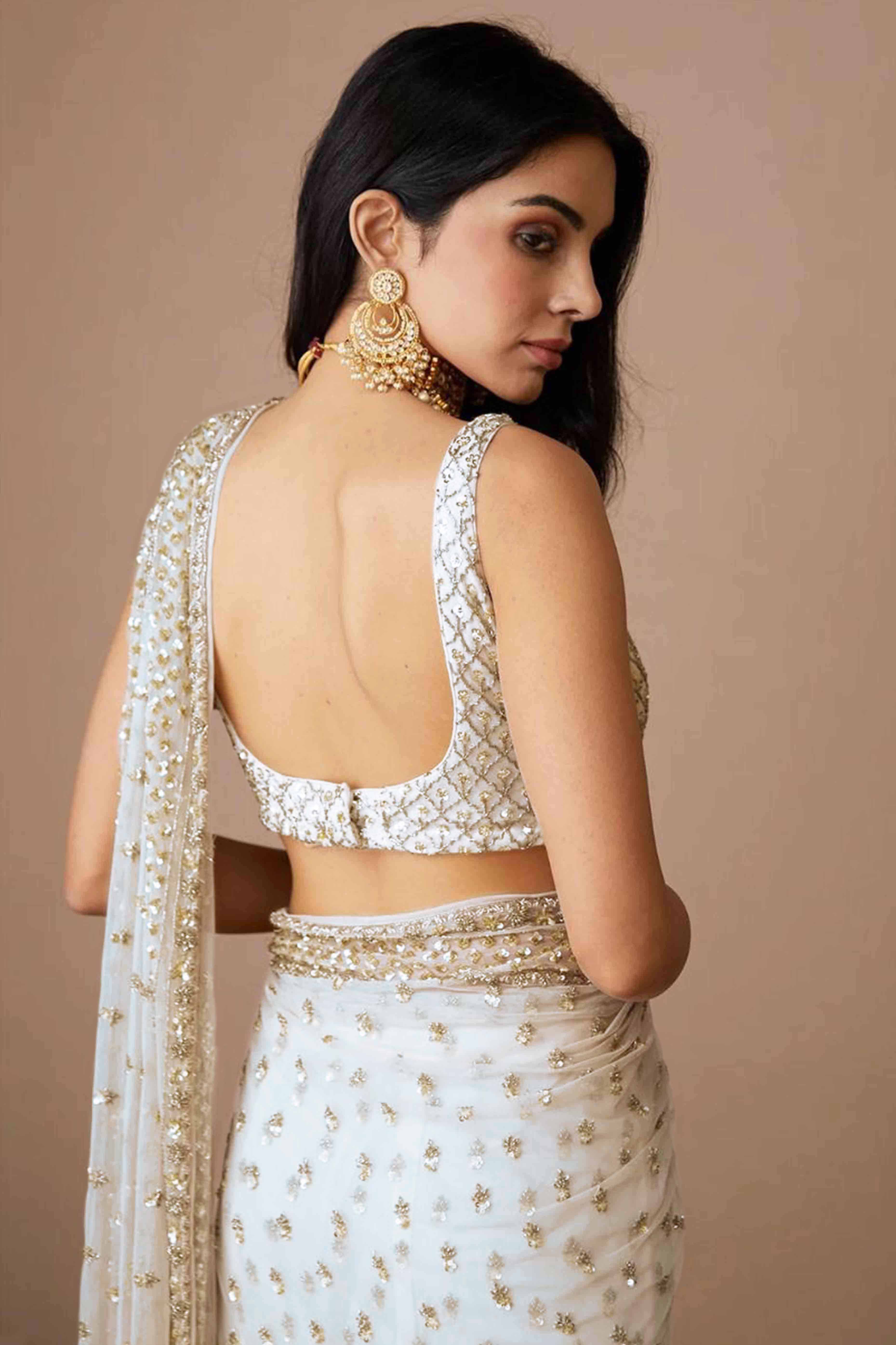 Graceful Off White Sequins Embellished Net Saree for Partywear