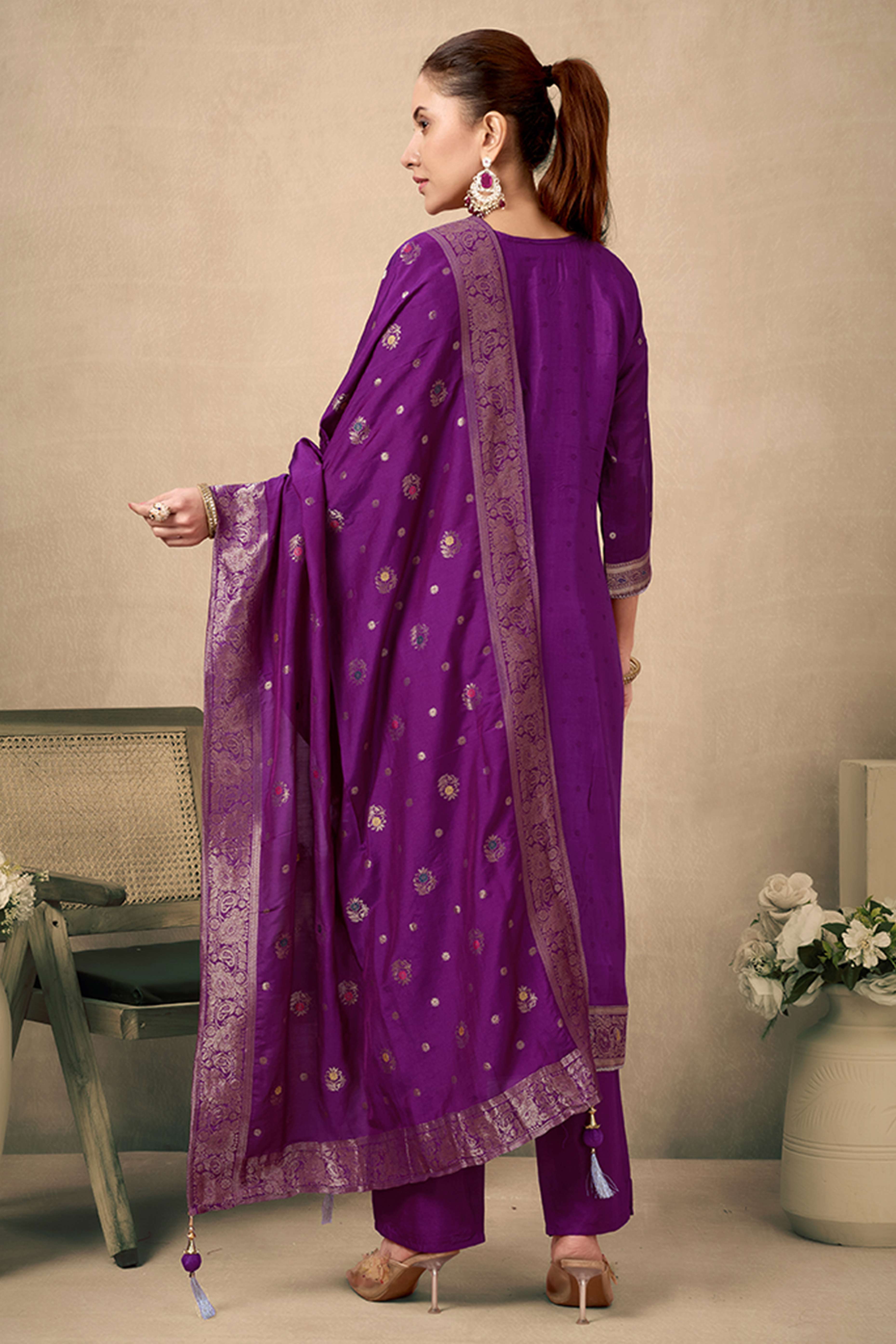 Wine Colored Viscose Jacquard Silk Straight Salwar Suit With Zari Weaving And Stone Work.
