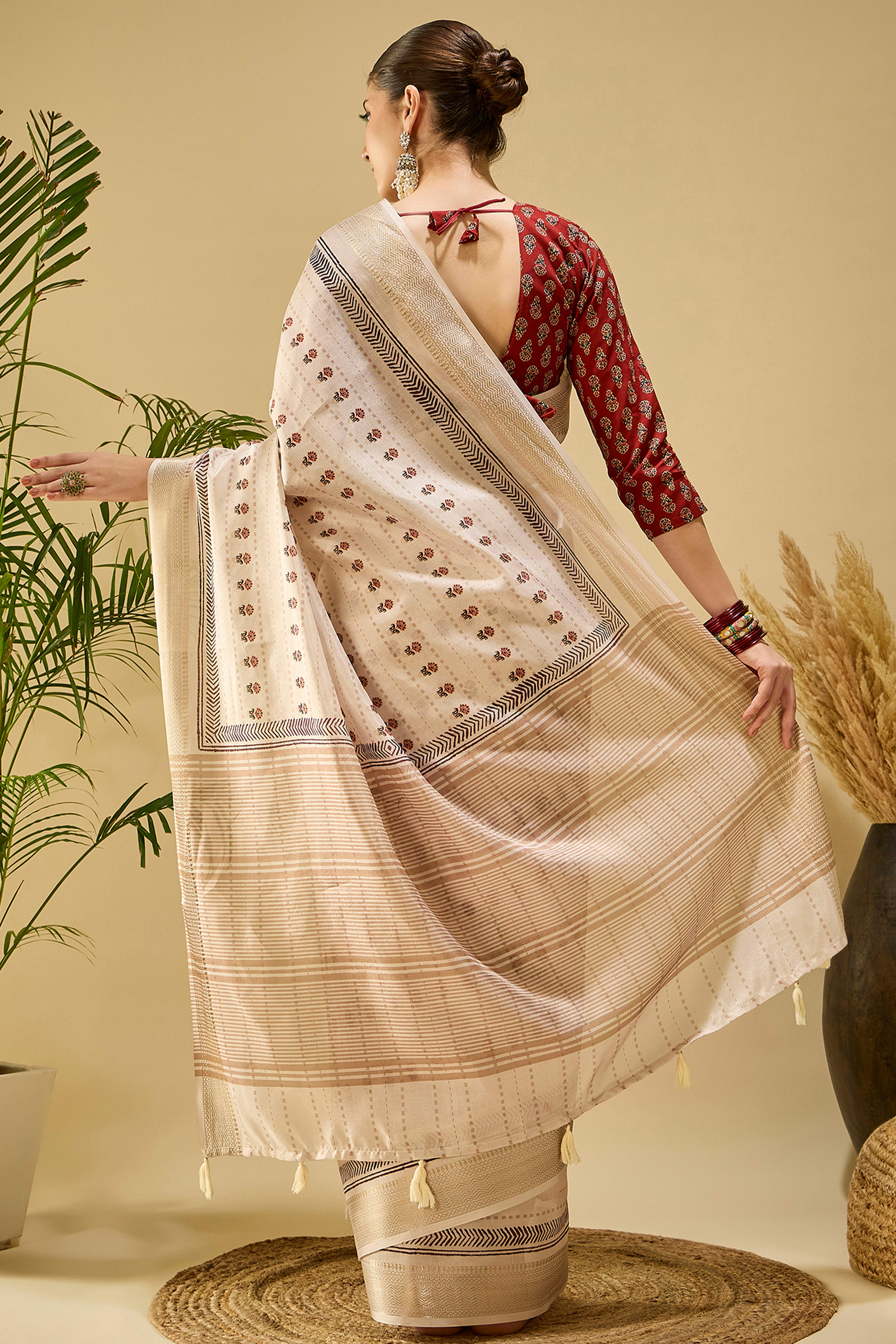 Timeless Cream Katki Cotton Silk Saree With Blooming Floral Prints & Tassel Draped Pallu