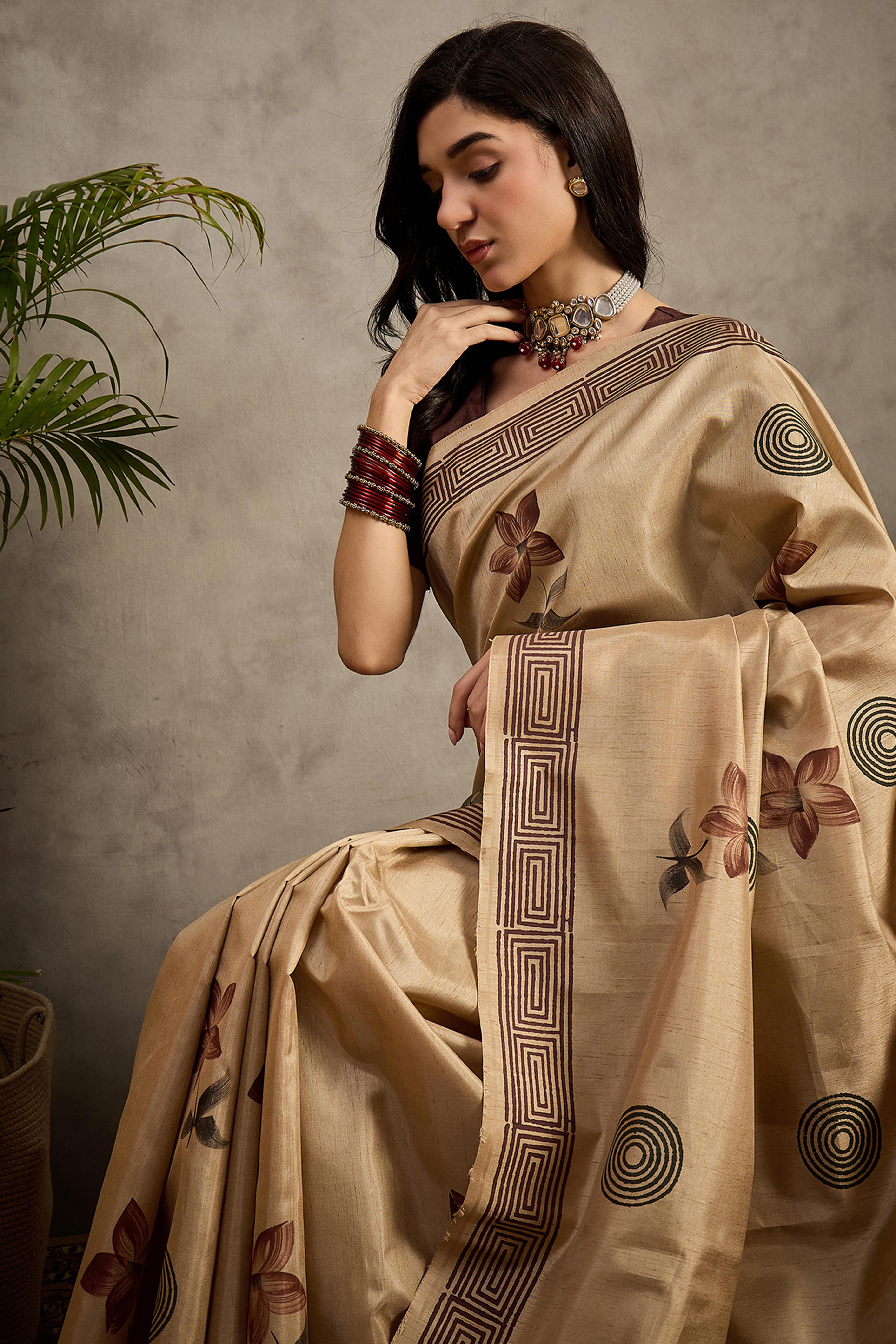 Refined Beige Floral Print Kozi Cotton Silk Saree Highlighted With Tassel Pallu