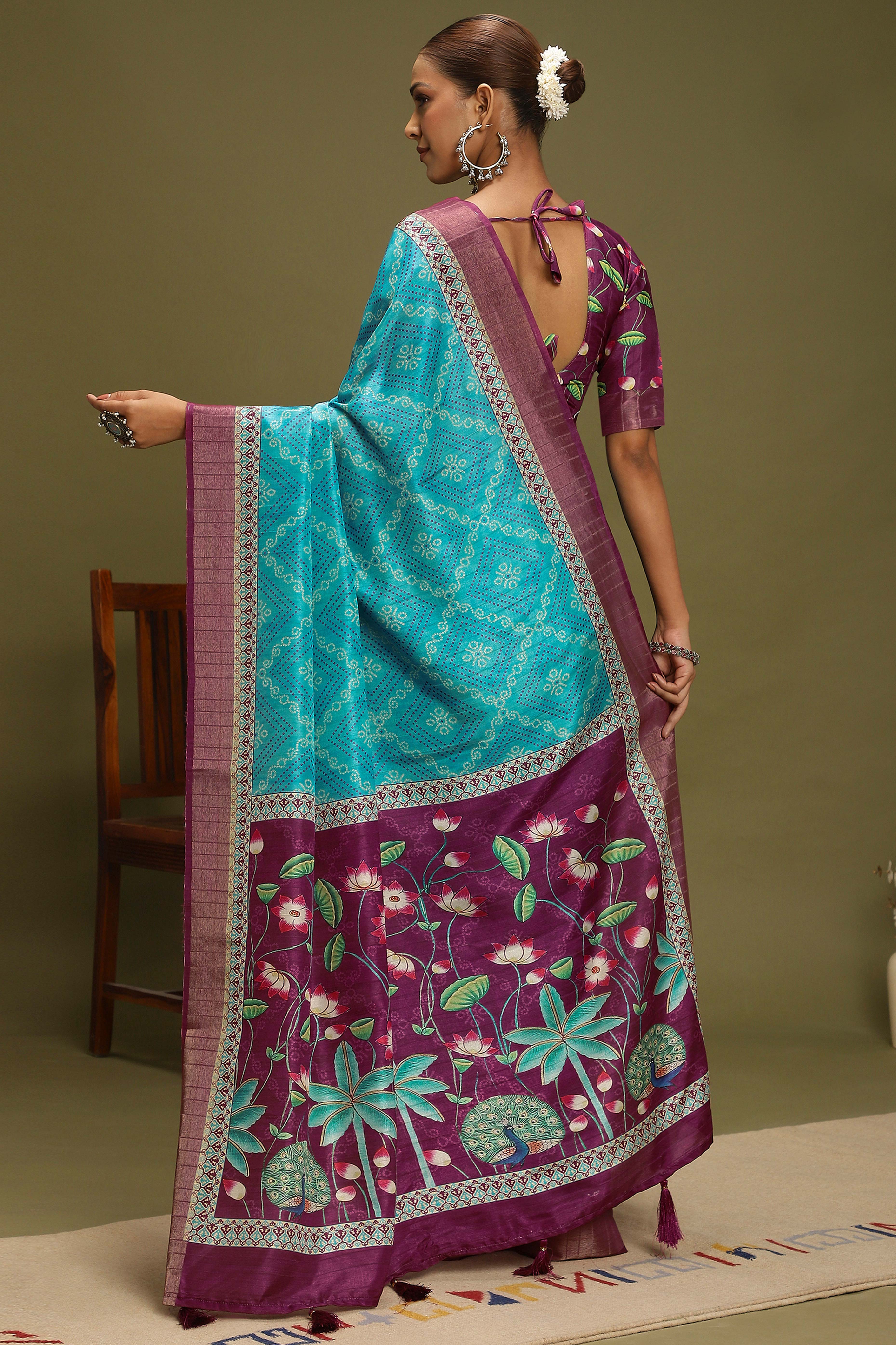 Turquoise Silk Blend Saree Decorated with Vibrant Bandhani Prints and Festive Detailing