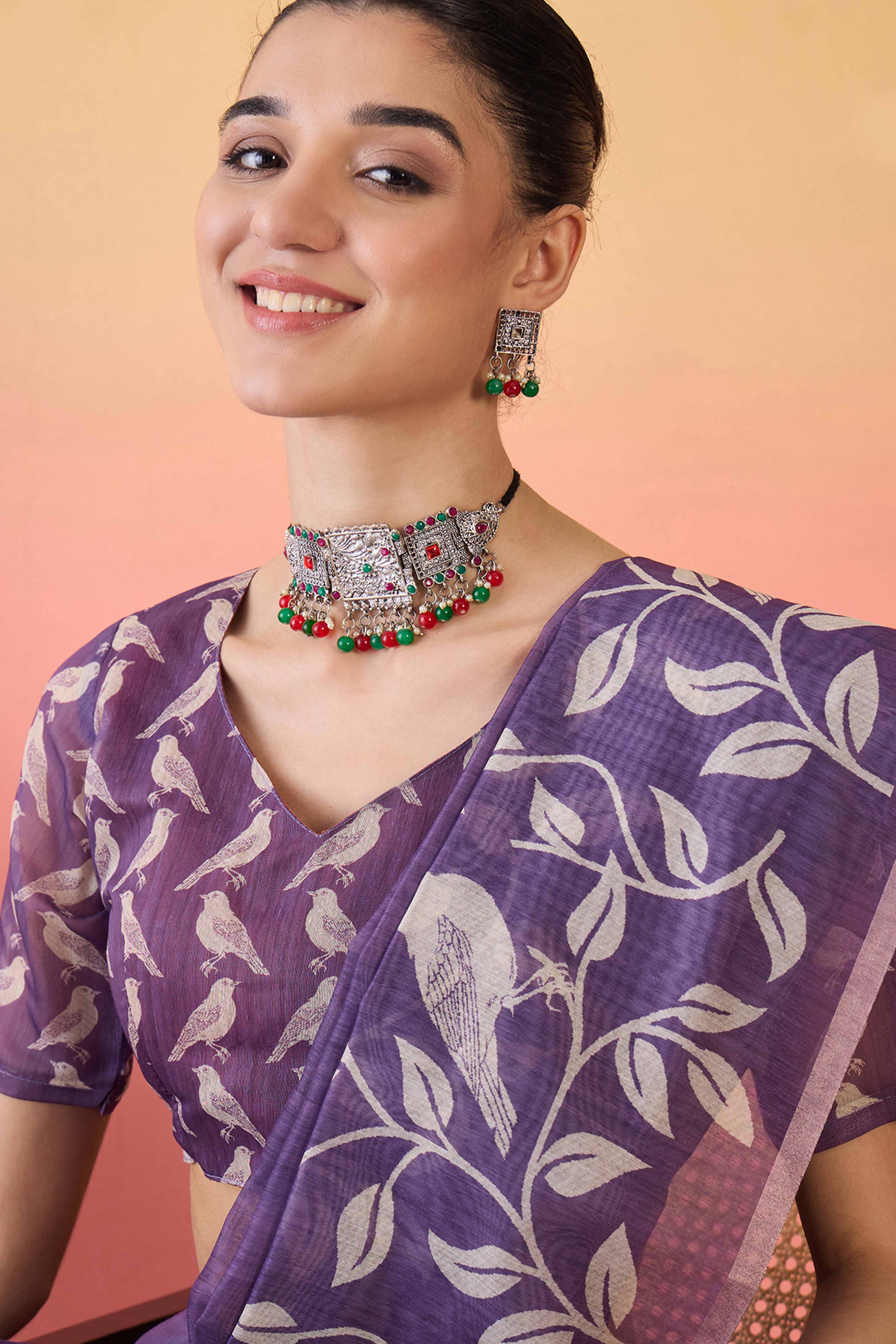 Purple Linen Cotton Saree Featuring Elegant Leaf & Bird Prints With Tassel Pallu