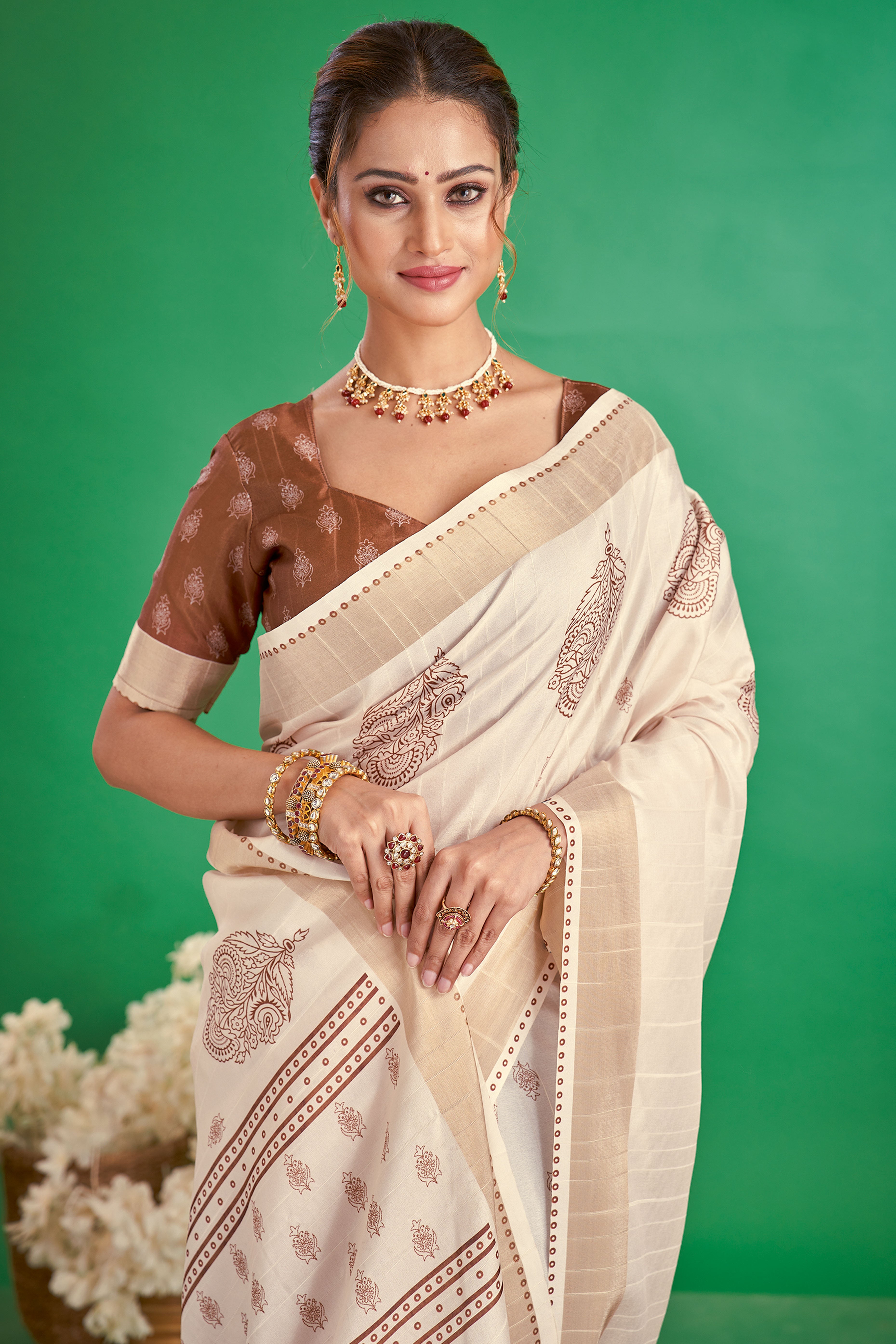 Charming Offwhite & Brown Floral Printed Kotha Cotton Silk Saree Adorned With Graceful Tassel Pallu