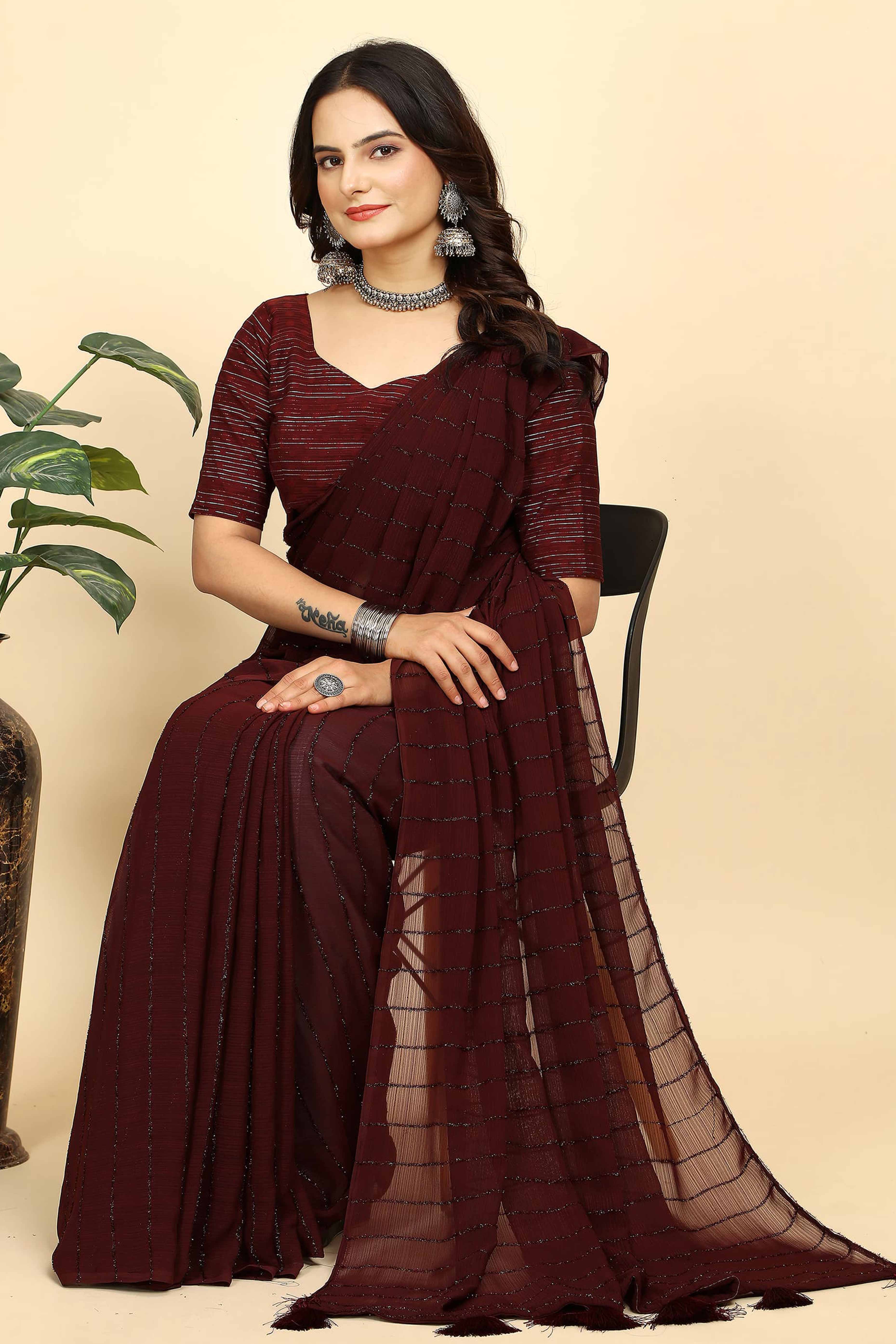 Dark Maroon Striped Zari Woven Chiffon Saree With Tassels