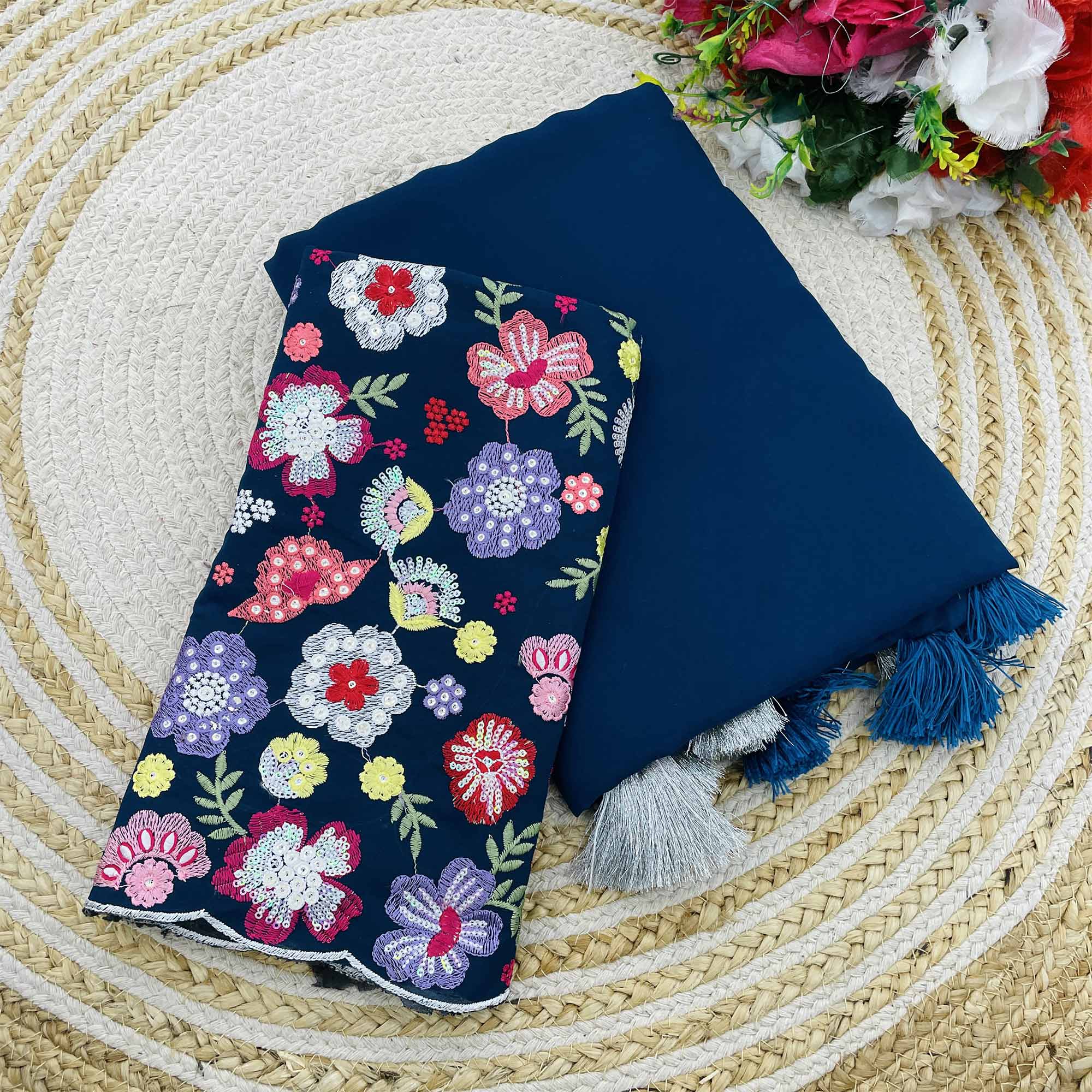 Blue Solid Georgette Saree With Tassels