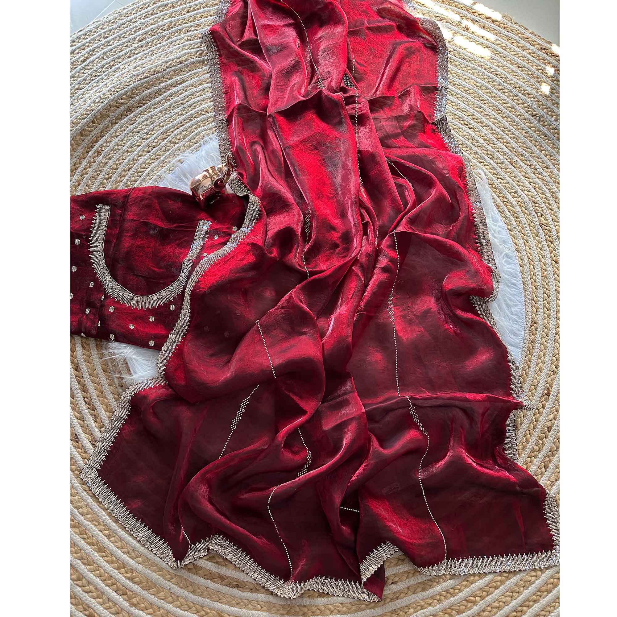 Classic Maroon Pure Silk Saree Adorned With Sparkling Jarkan Work & An Exquisite Designer Border