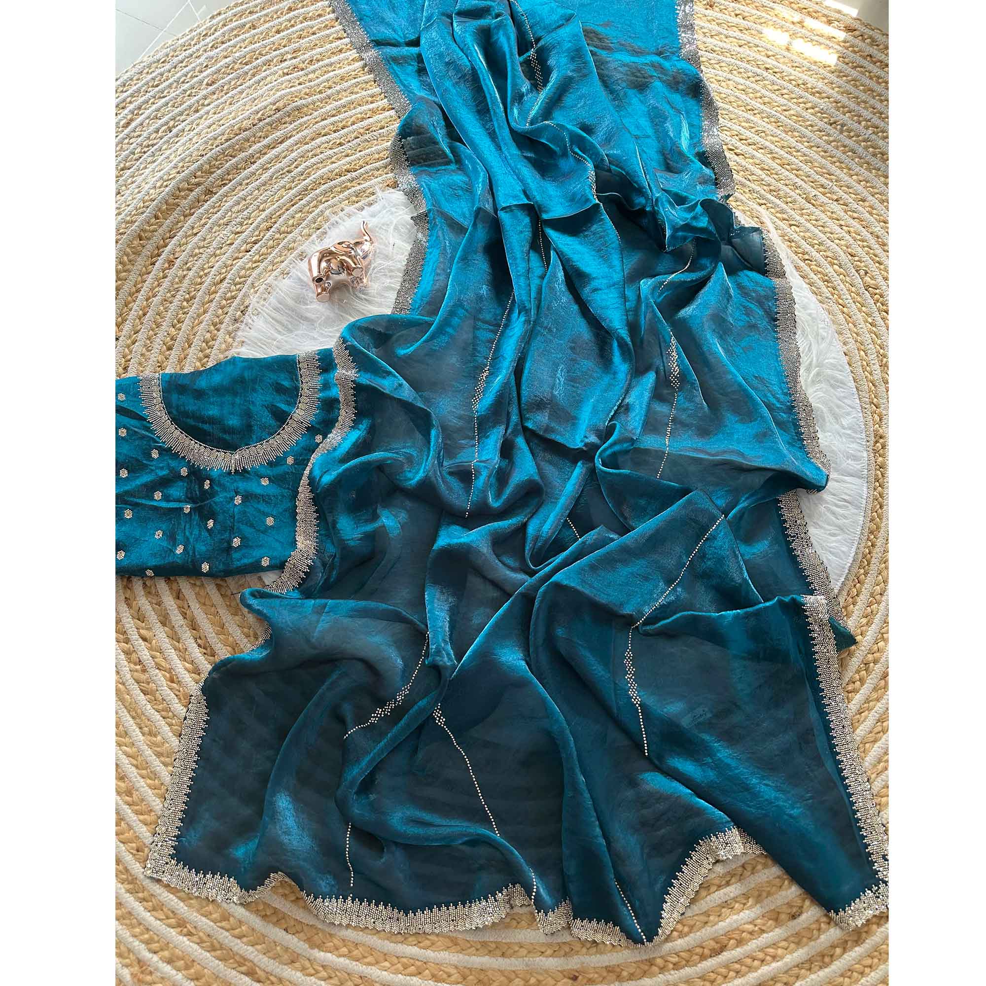 Classic Peacock Blue Pure Silk Saree Adorned With Sparkling Jarkan Work & An Designer Border