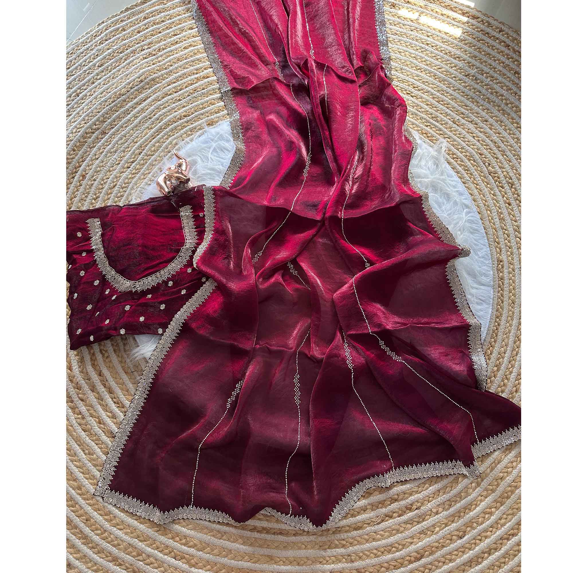 Classic Wine Pure Silk Saree Adorned With Sparkling Jarkan Work & An Exquisite Designer Border