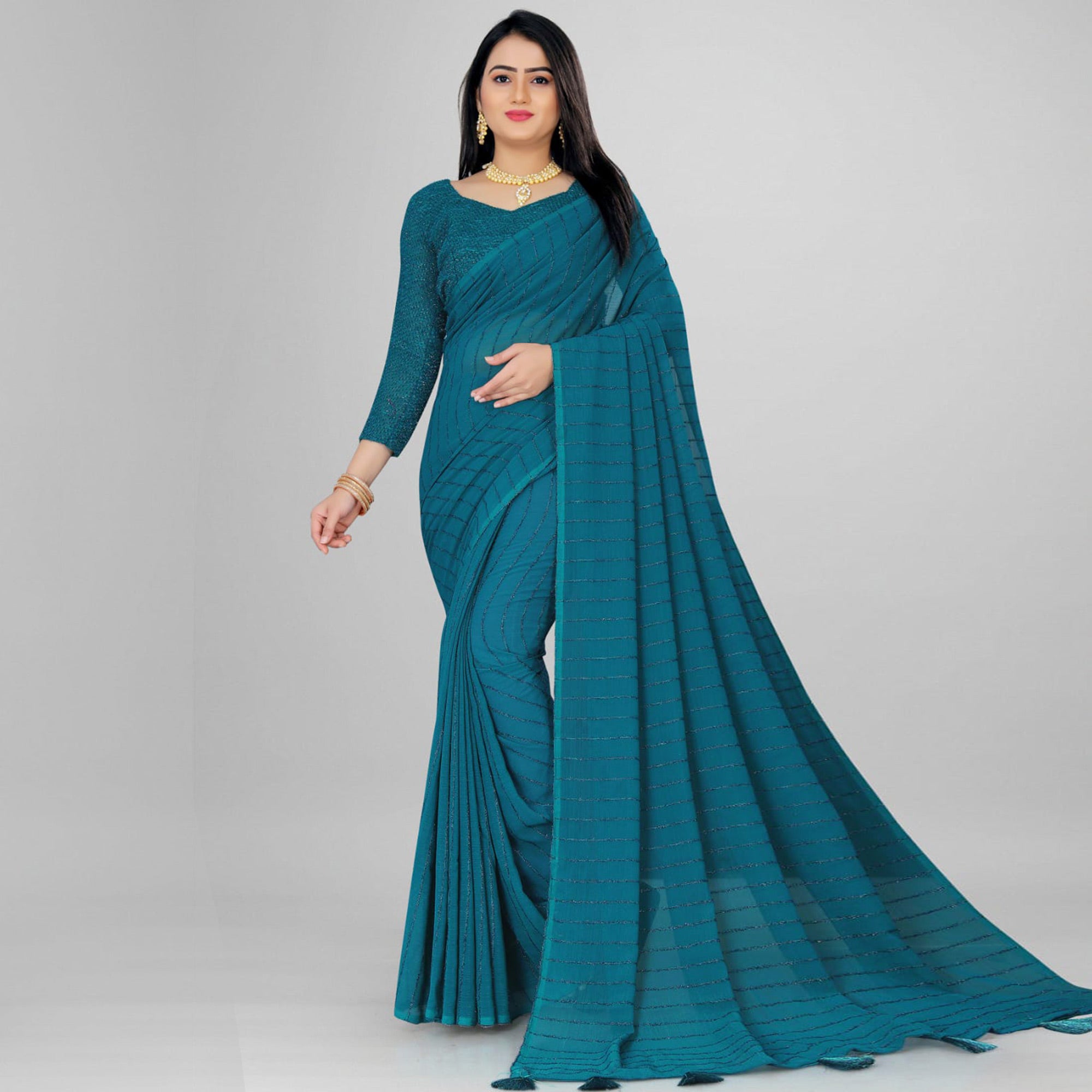 Teal Woven Chiffon Saree with Tassels