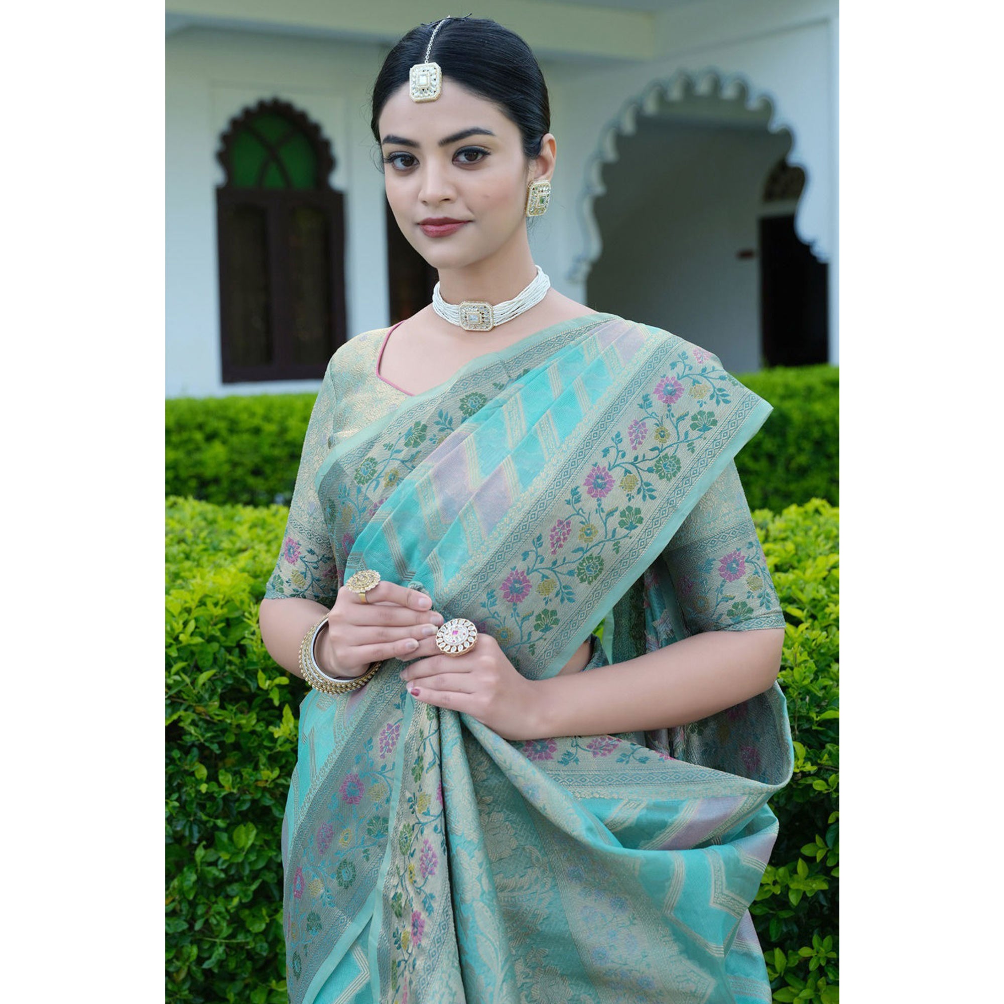Blue Woven Organza Saree With Tassels
