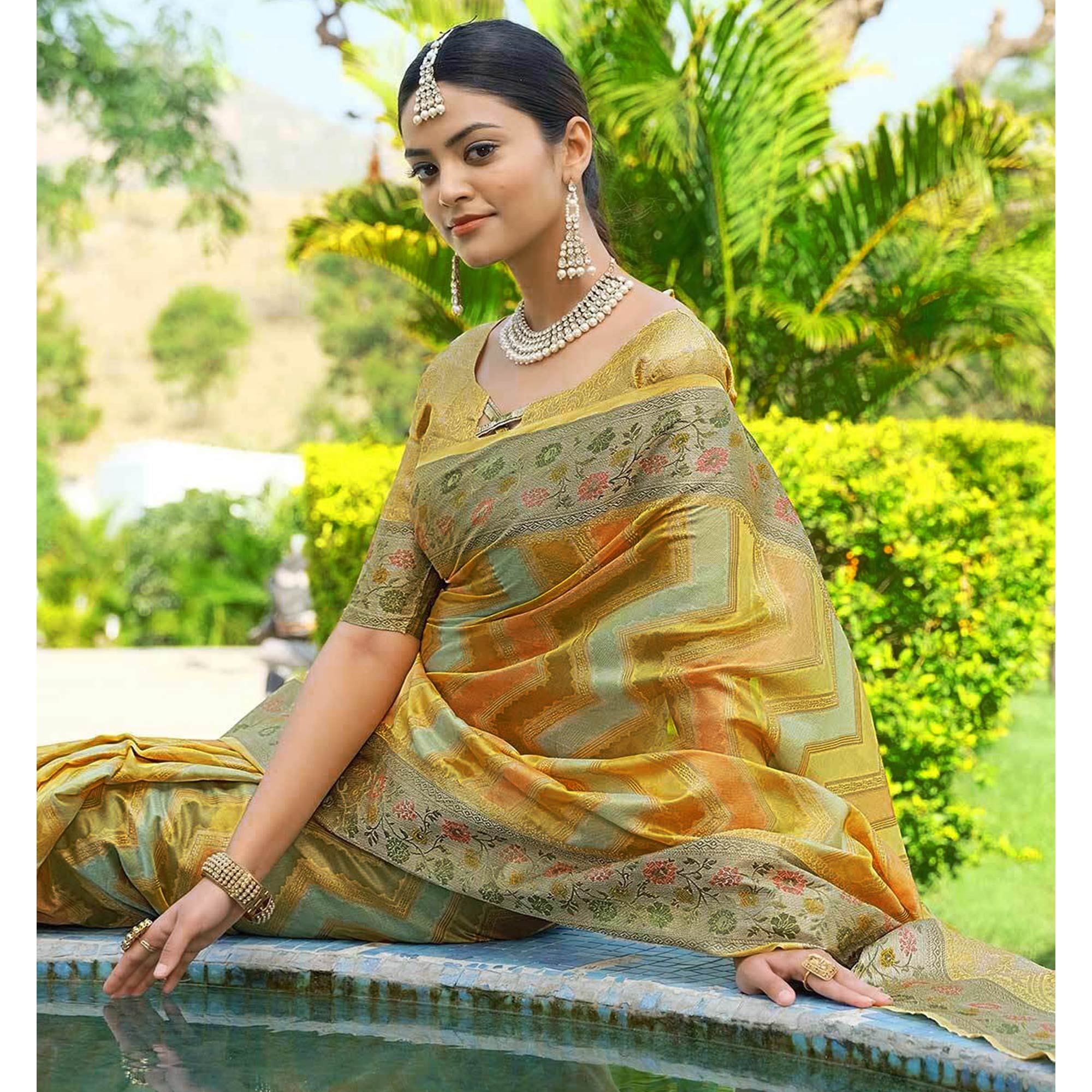Yellow Woven Organza Saree With Tassels