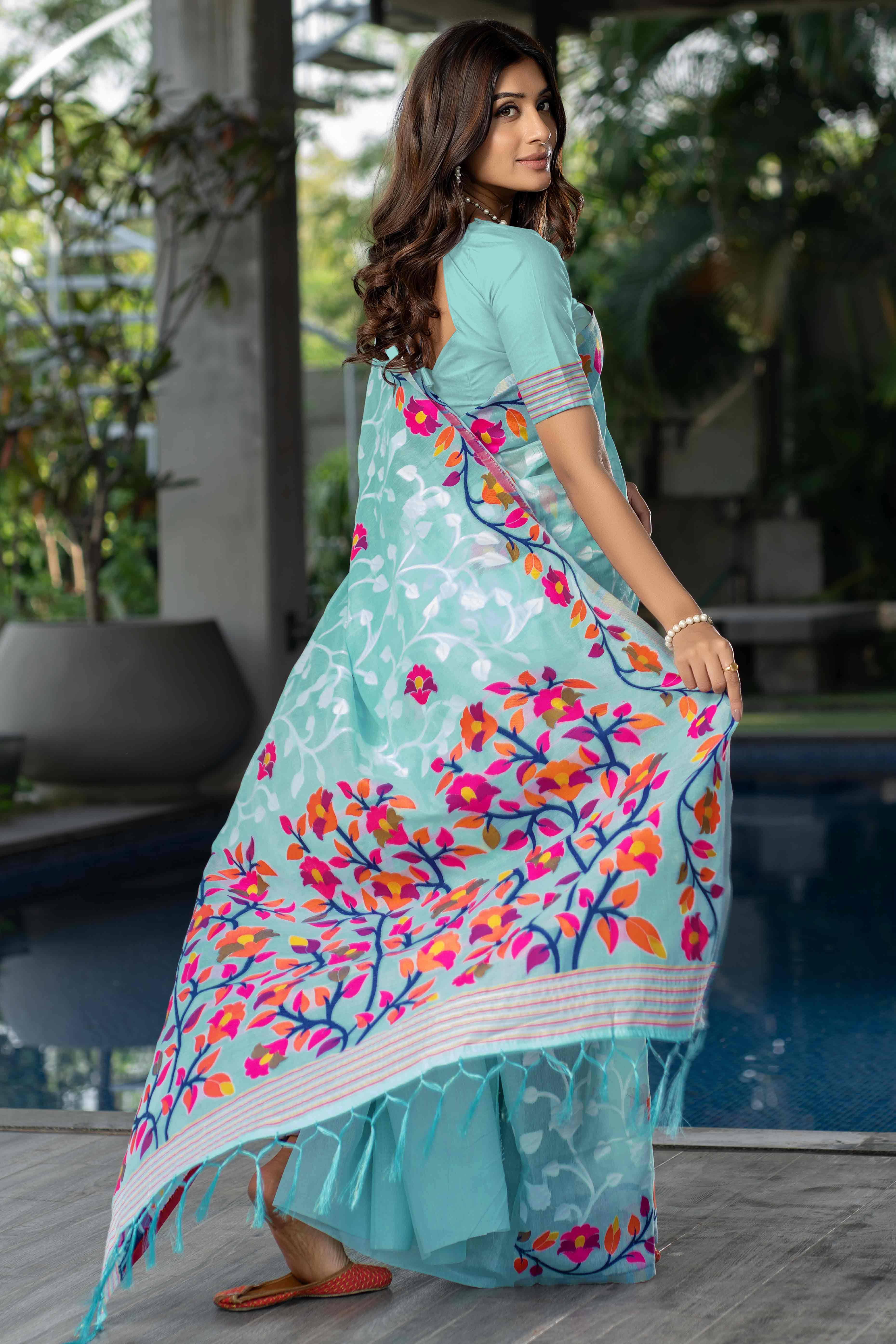 Blue Floral Woven Cotton Jacquard Jamdani Saree With A Graceful Tassel Border