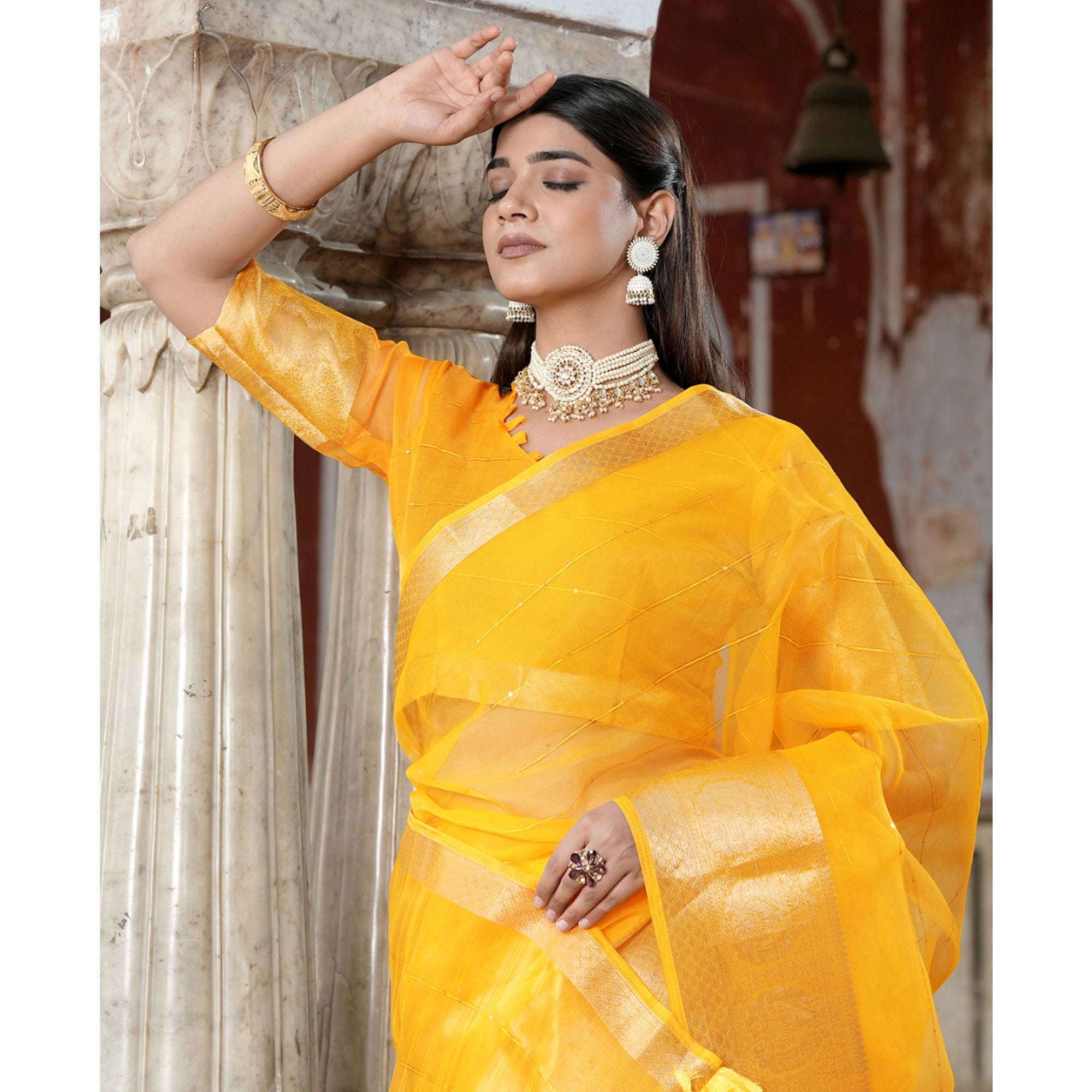 Yellow Sequins Embroidered Organza Saree With Woven Border