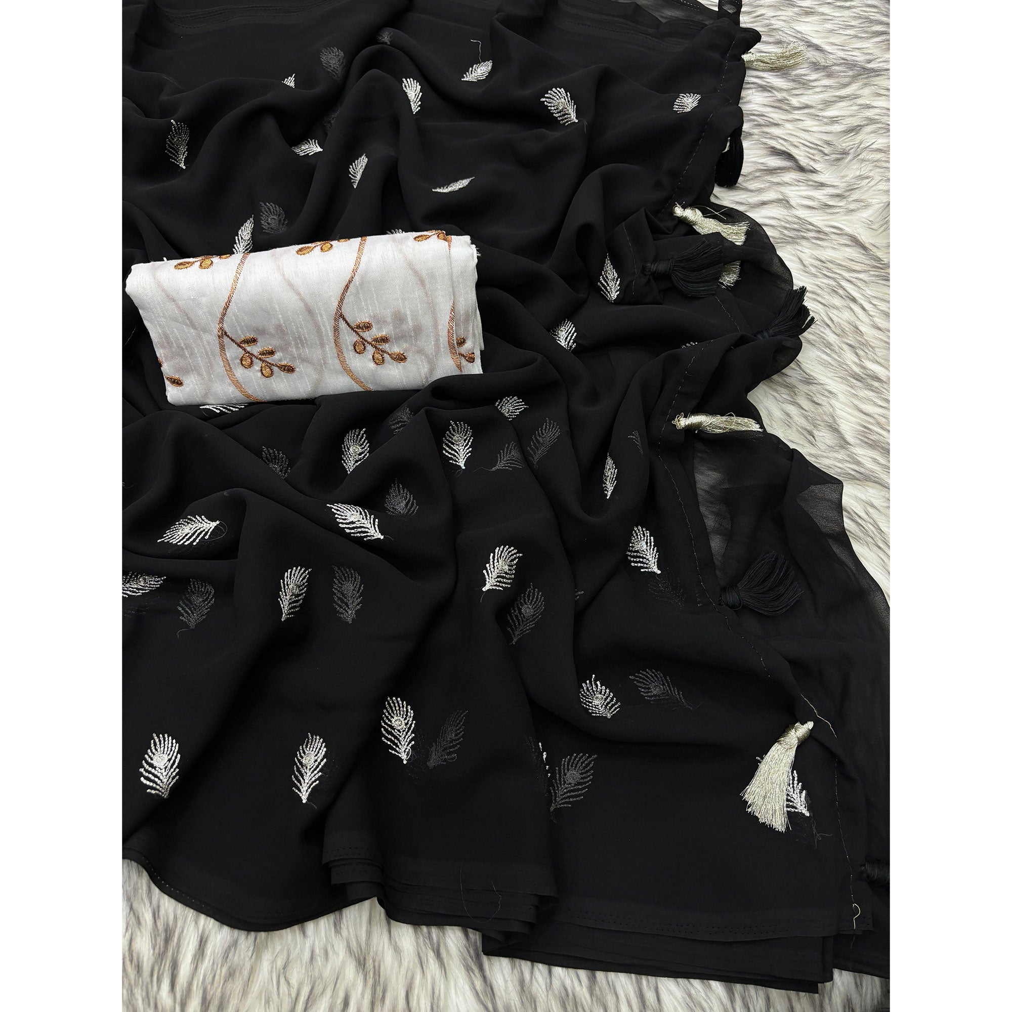 Black Embroidered Georgette Saree With Tassels
