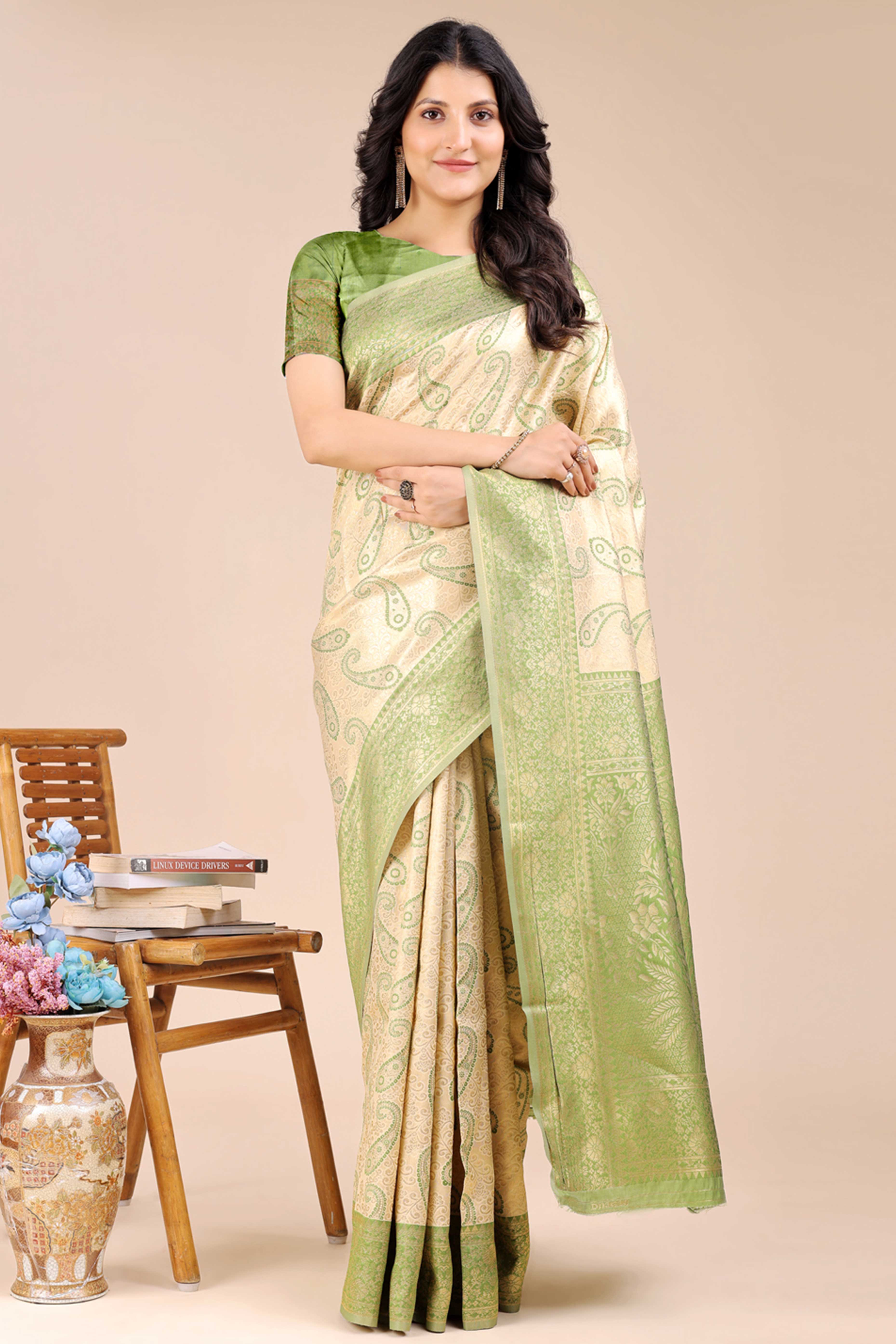 Cream Banarasi Silk Saree Featuring Light Green Floral Zari Weaving and a Rich Contrast Border