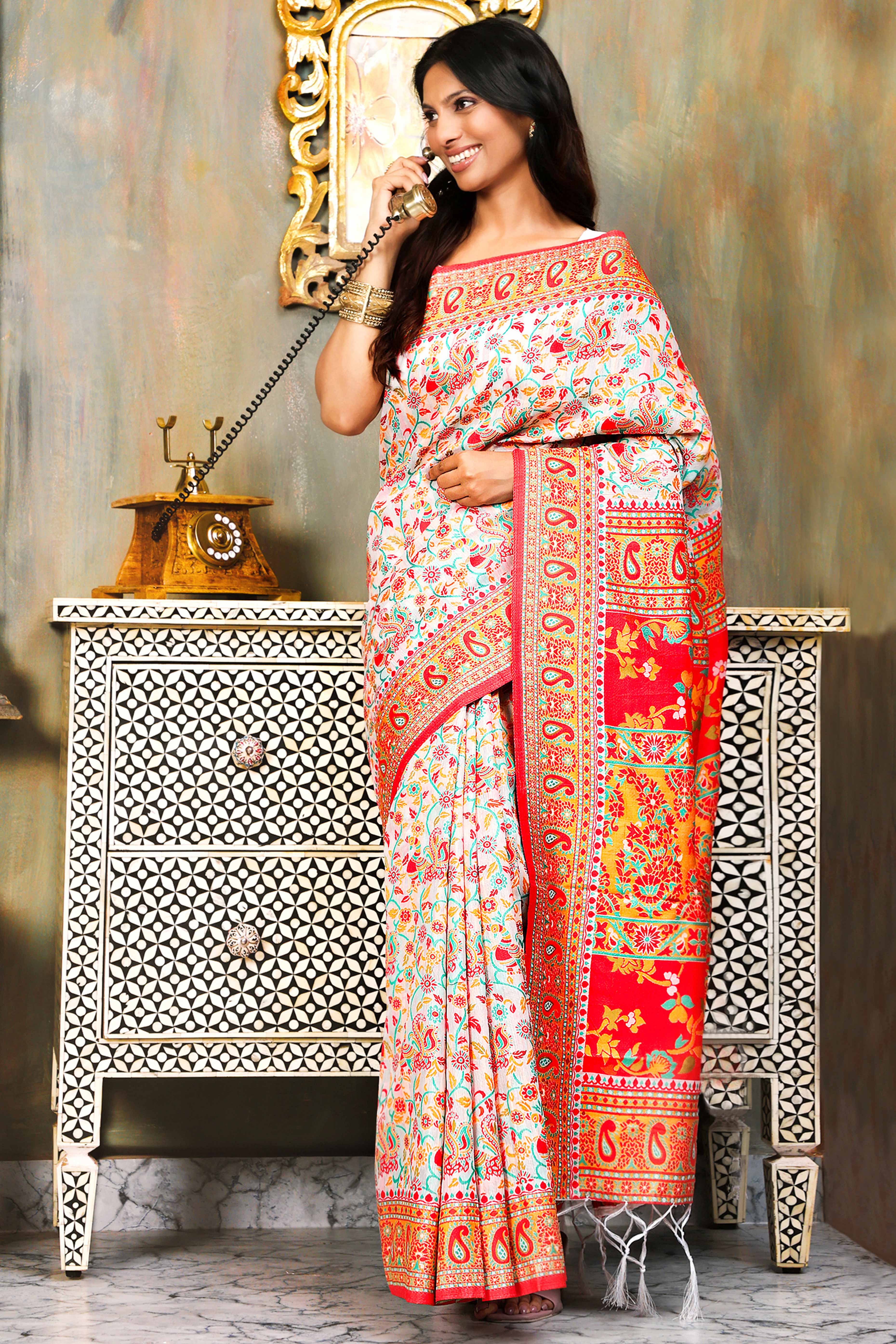White With Multicolor Linen Cotton Silk  Saree Enhanced Floral Zari Weaving & Tasselled Pallu